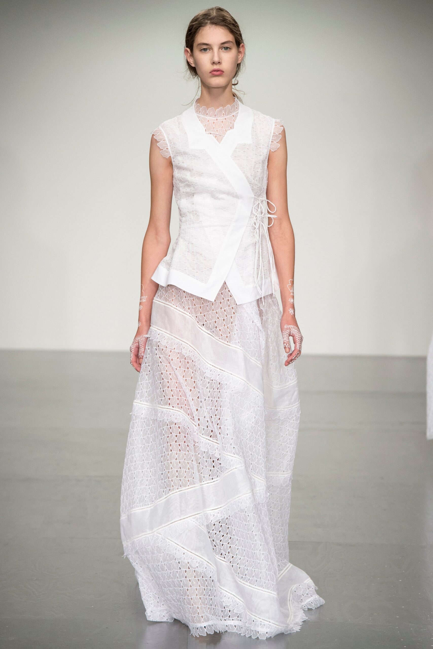 white embroidered sleeveless dress