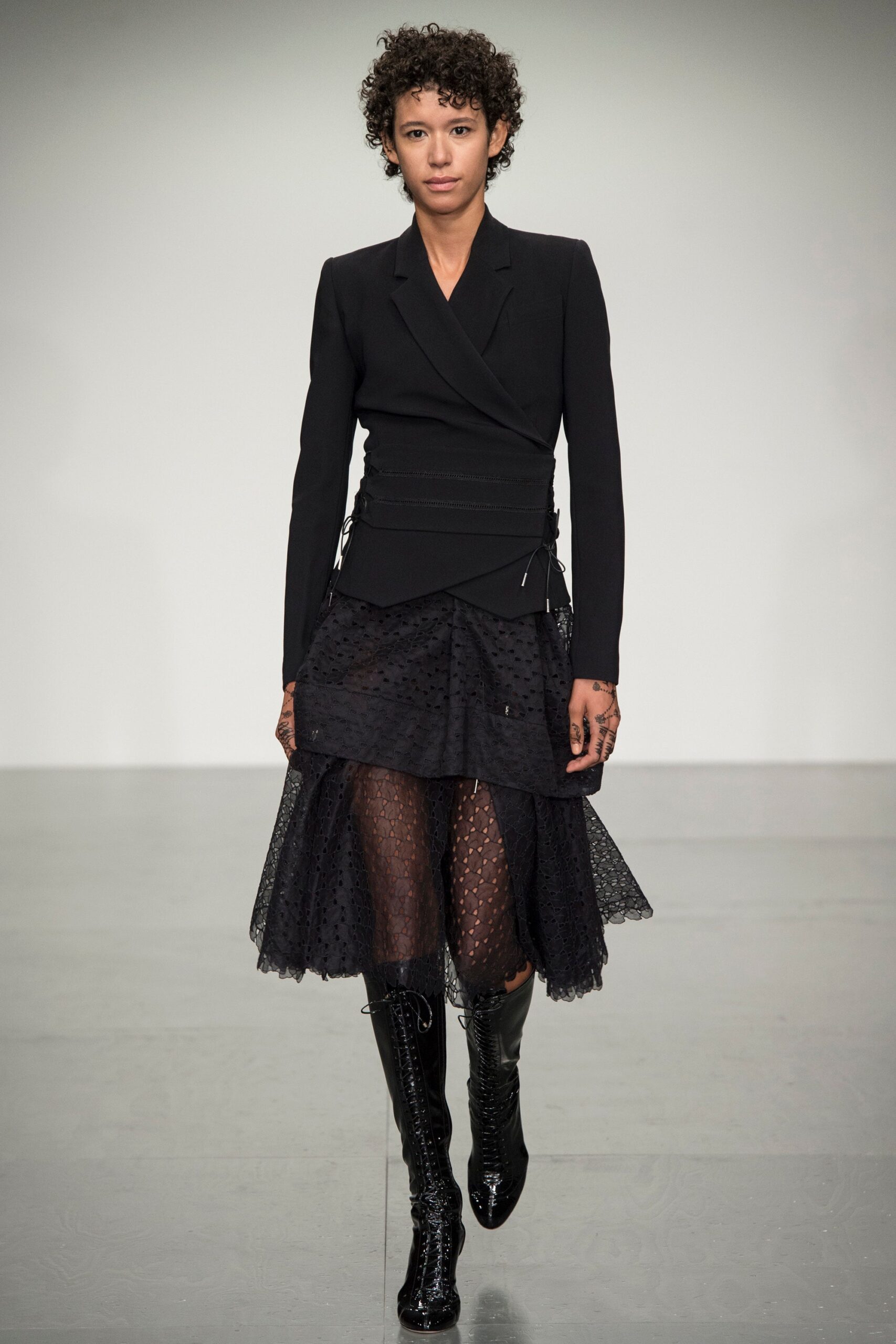 black fitted blazer and layered skirt