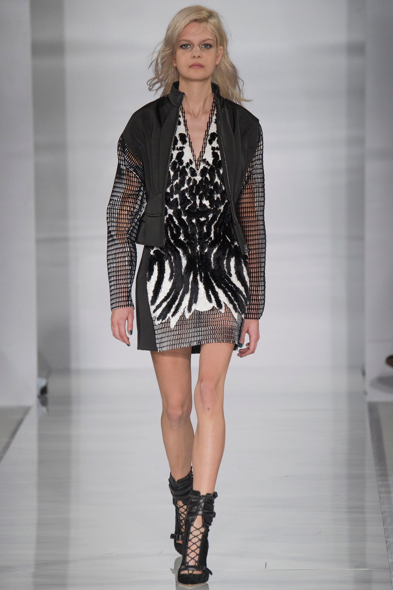 black and white embellished mini dress with leather jacket