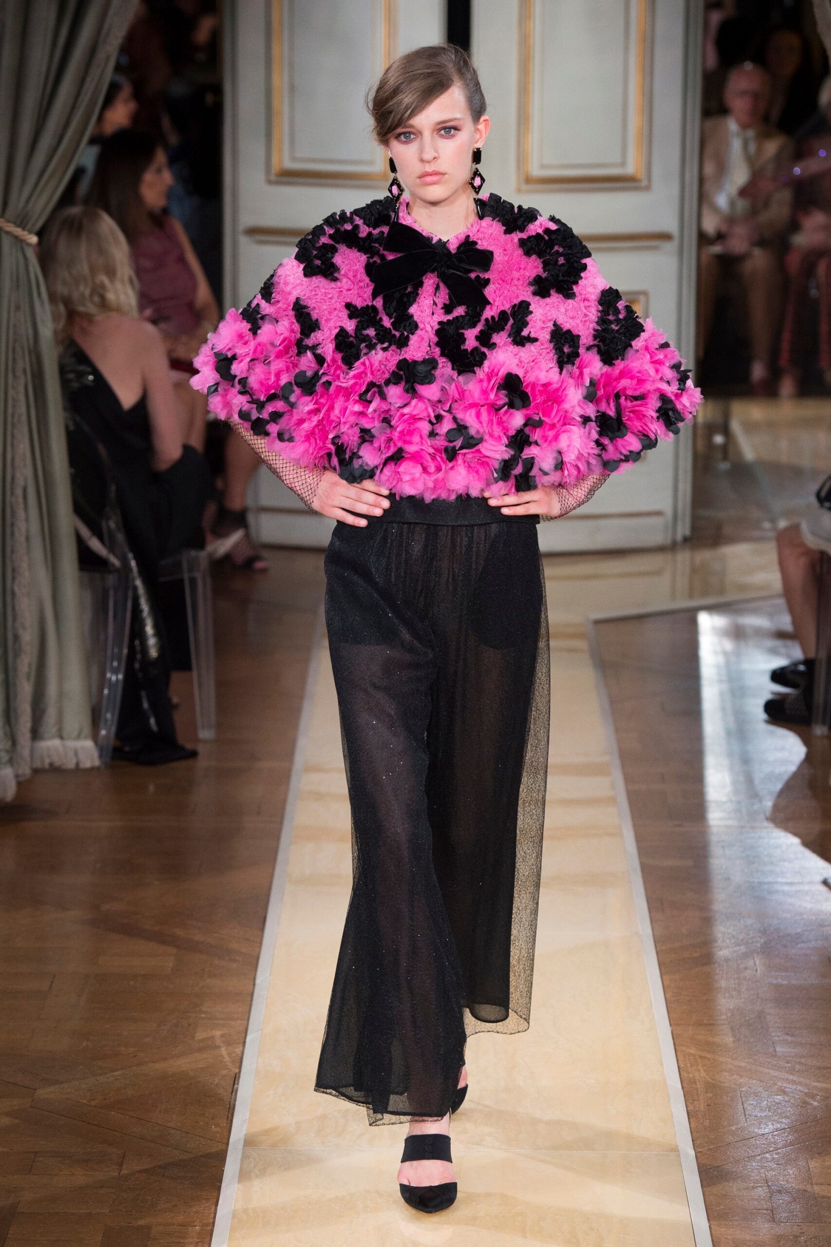 pink ruffled top with sheer pants