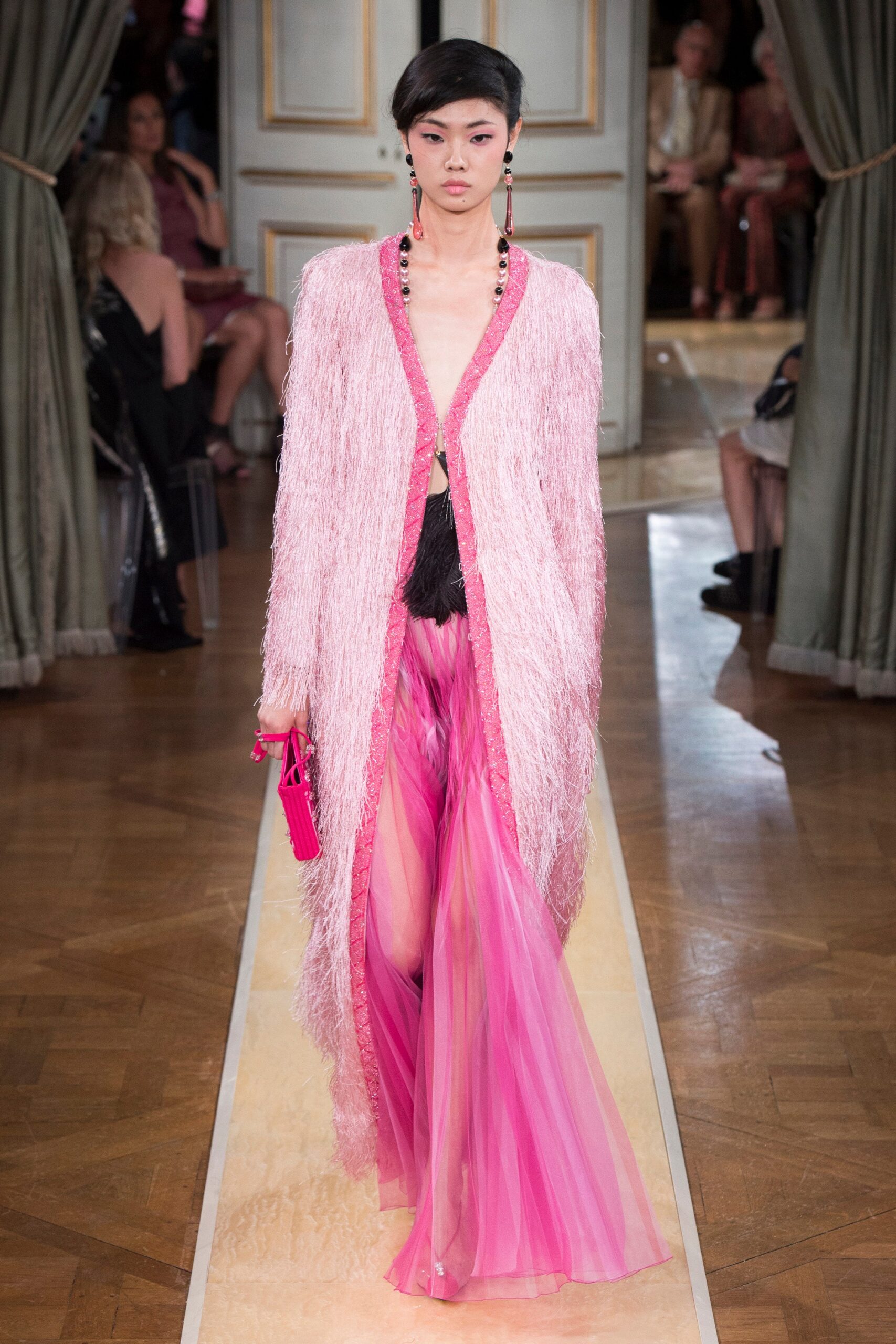 pink fringed coat and layered skirt