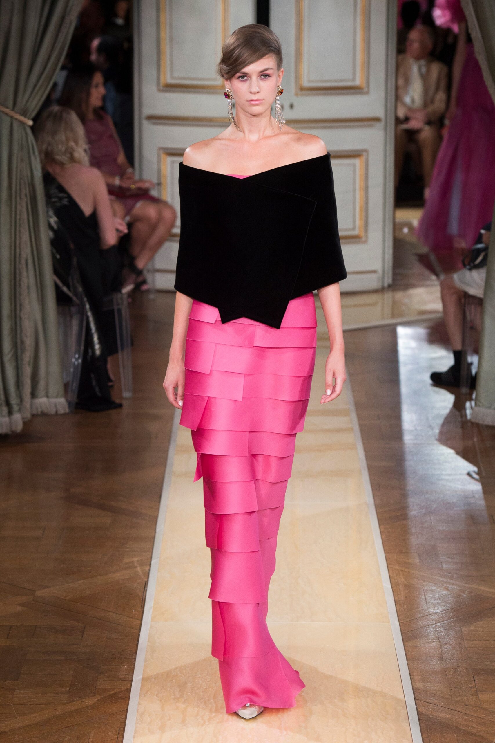 black off-shoulder top and pink tiered skirt