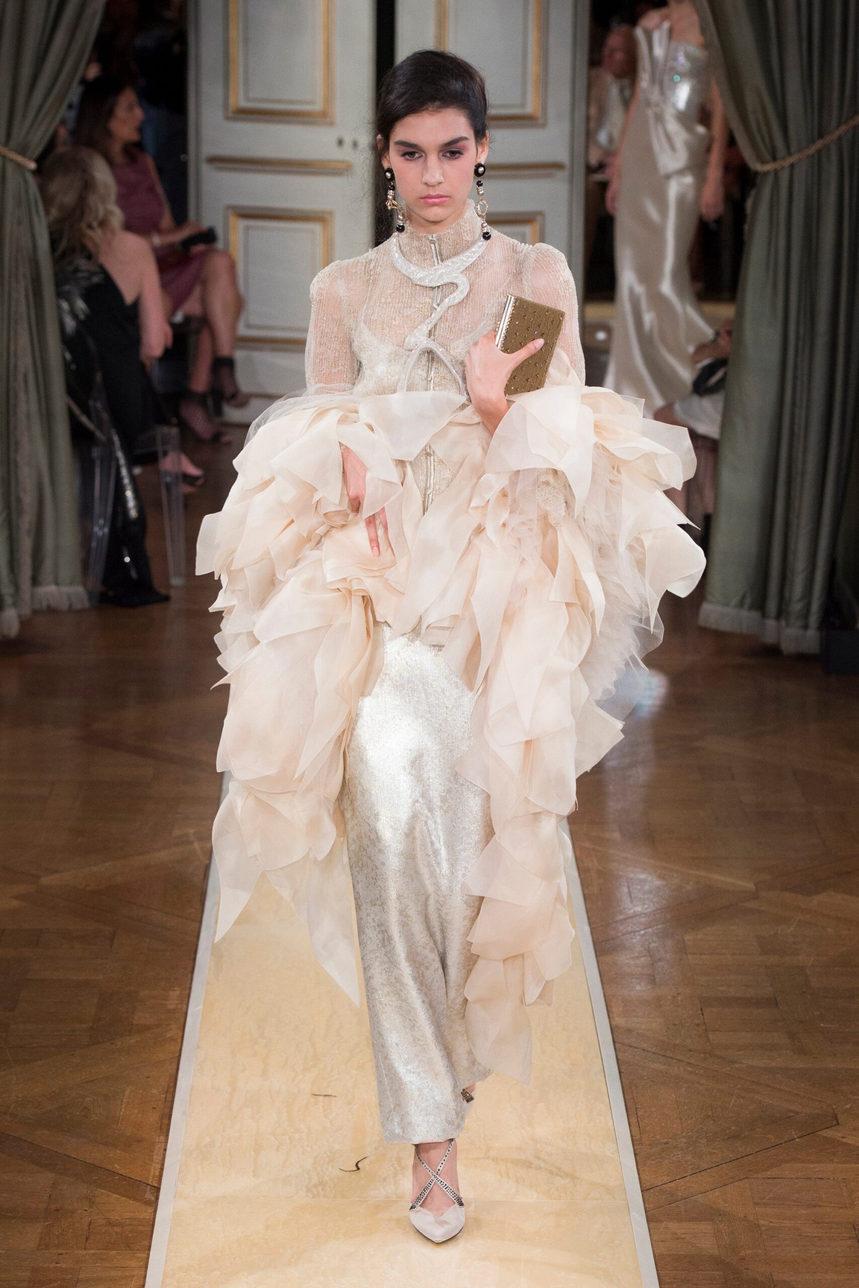 white silk ruffled gown