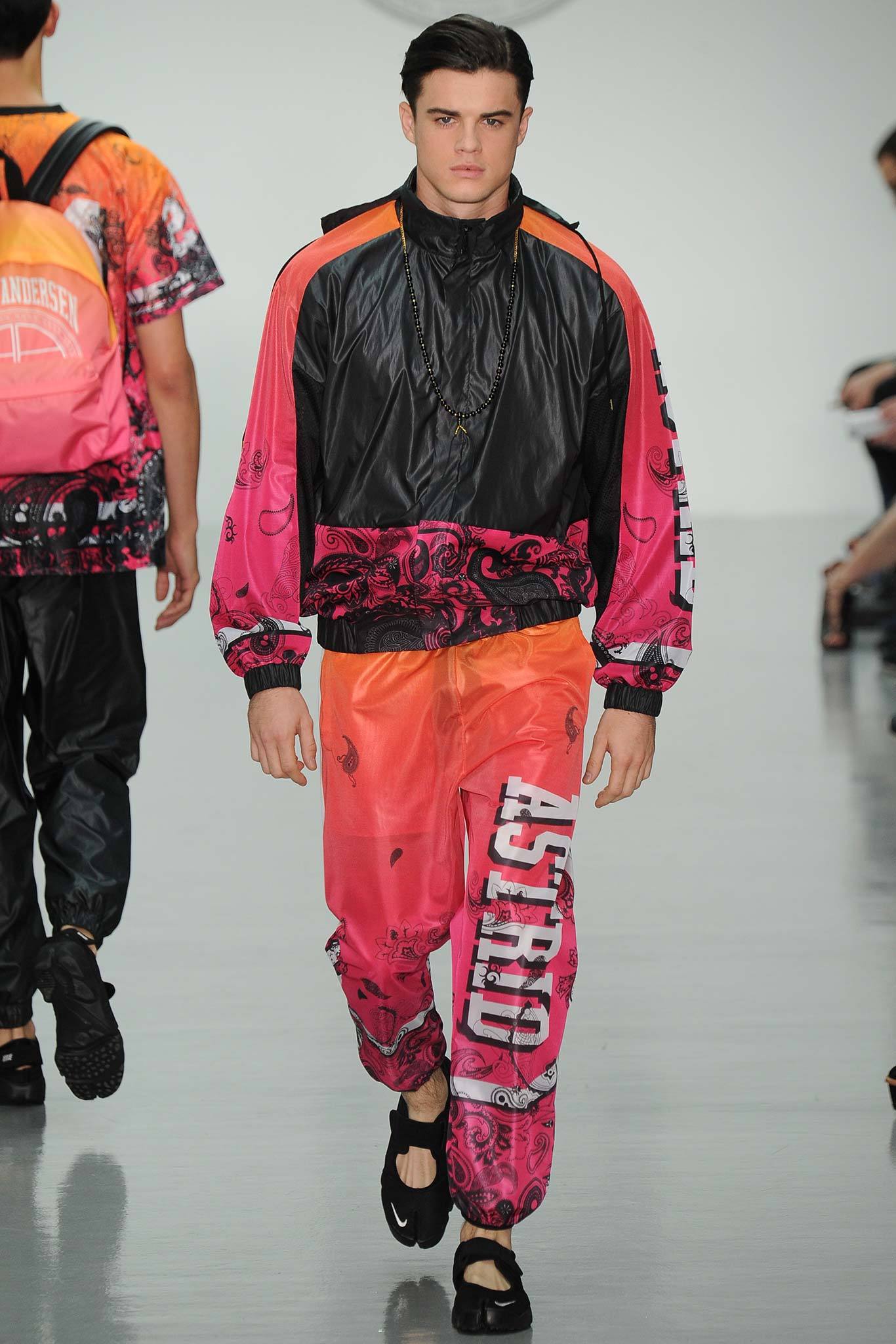 black and pink vinyl jacket and pants