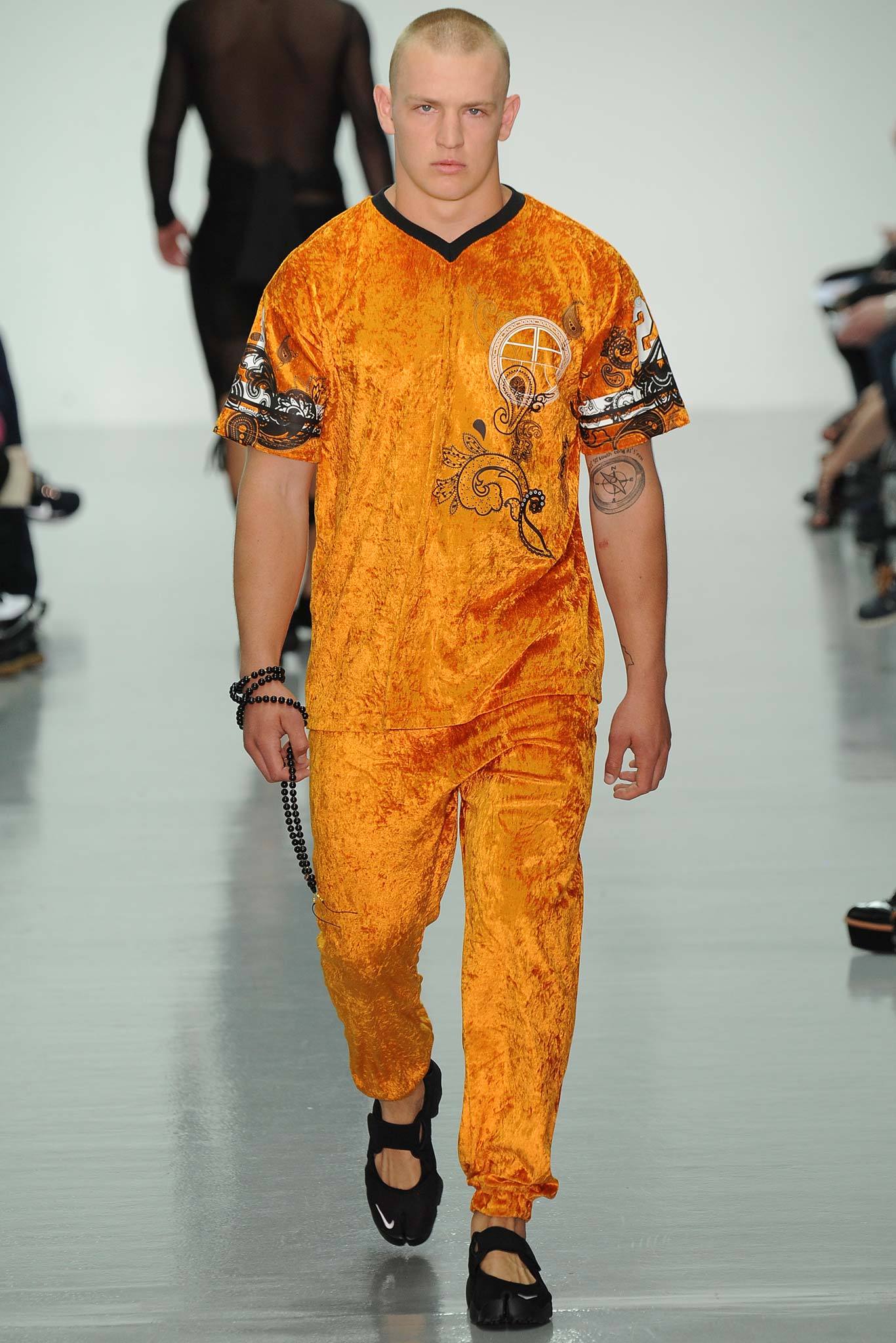 orange velvet long-sleeve relaxed printed pants