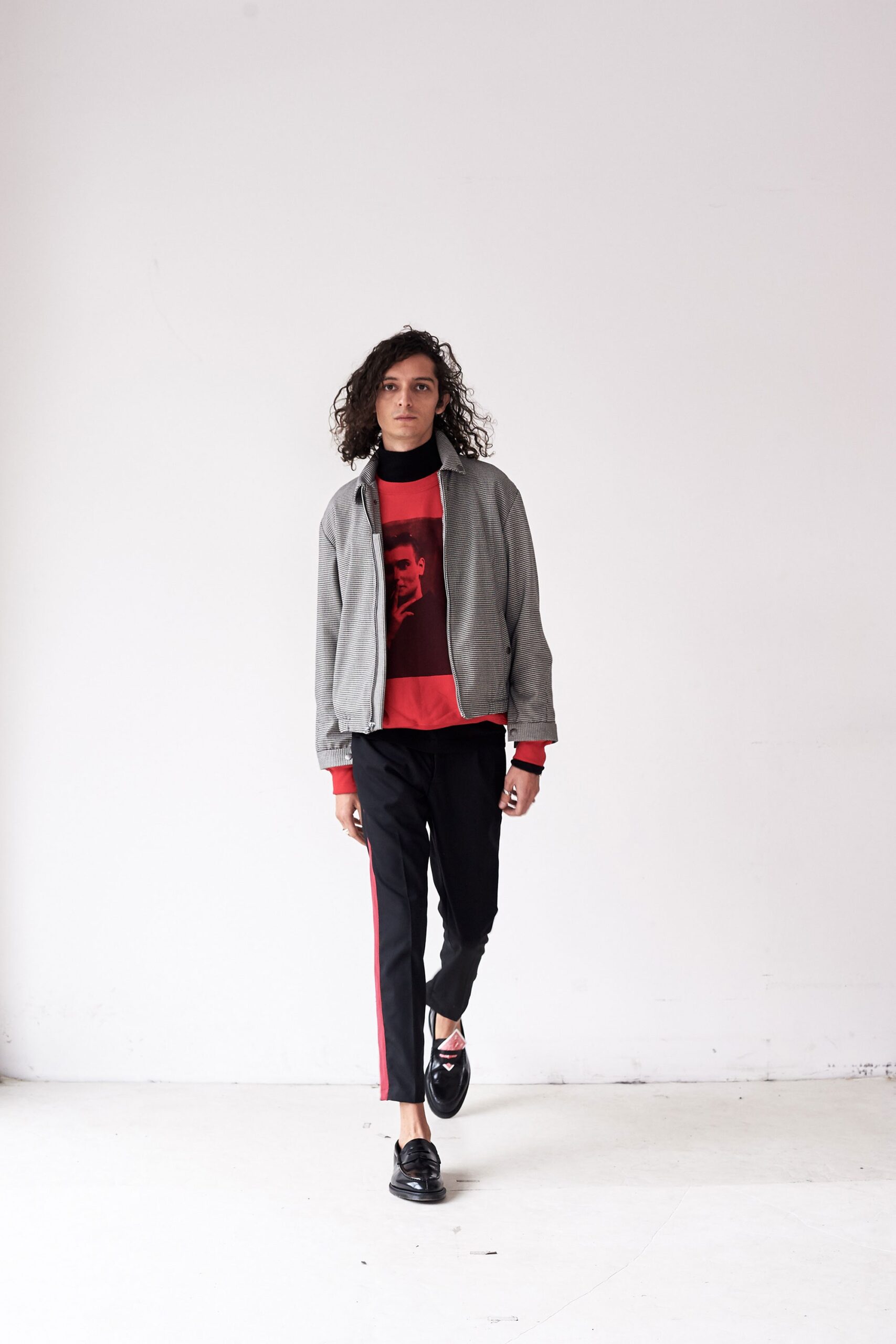 gray jacket red top black pants