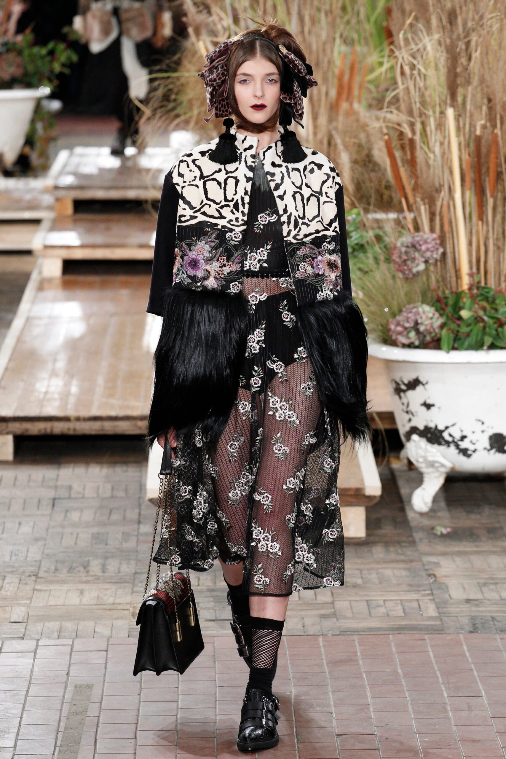 black fur long-sleeve collared relaxed buttoned coat