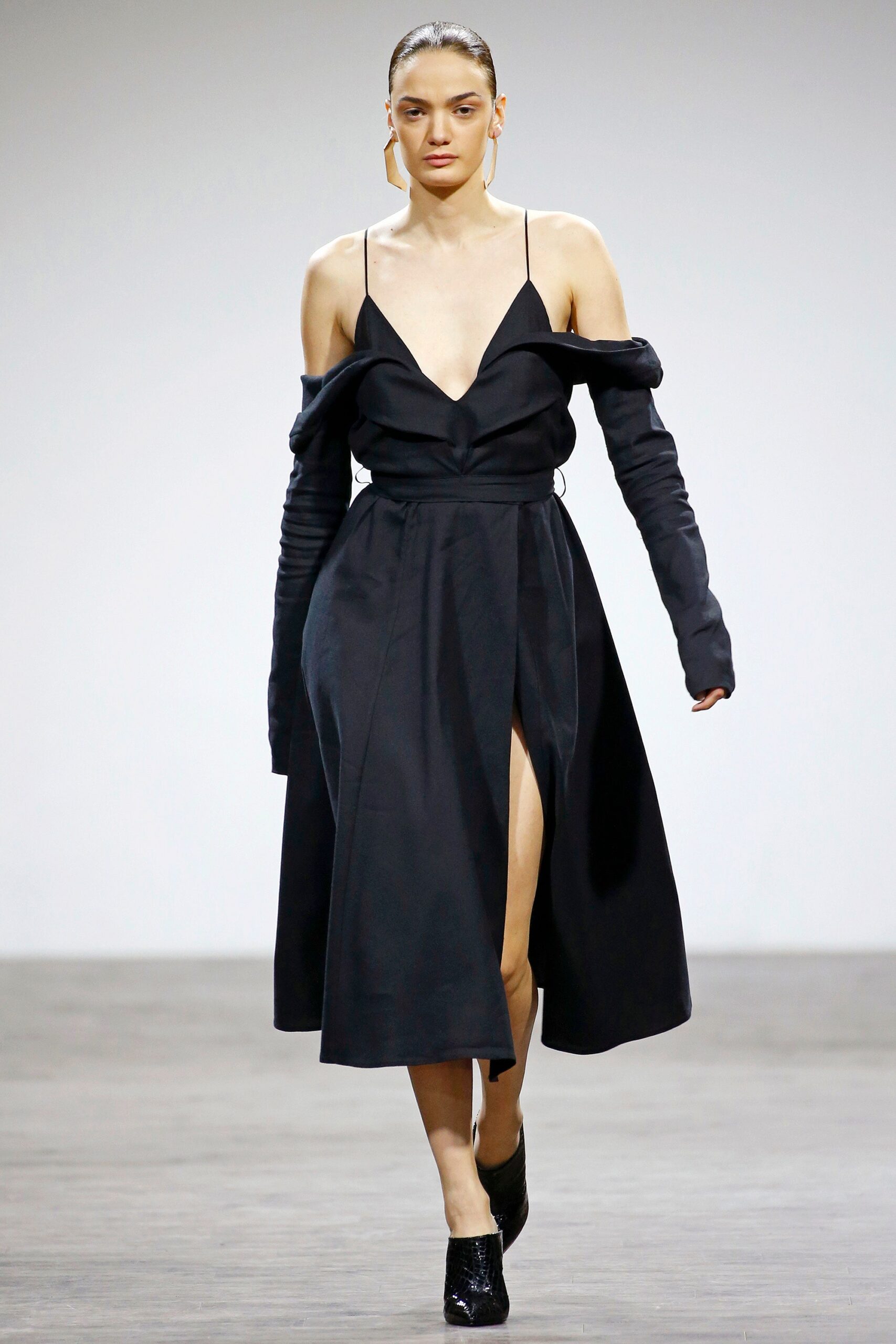 black off-shoulder slit midi dress