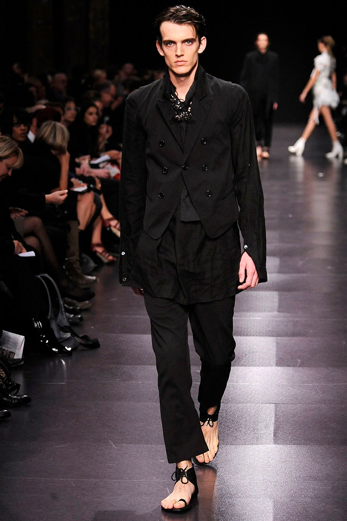 black tailored suit with flat shoes