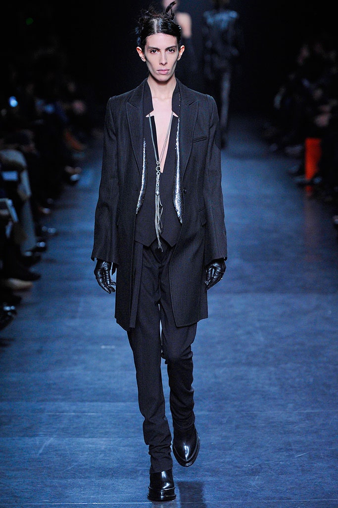 black tailored suit with leather gloves