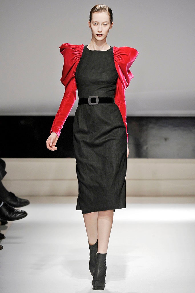 black fitted midi dress with red jacket