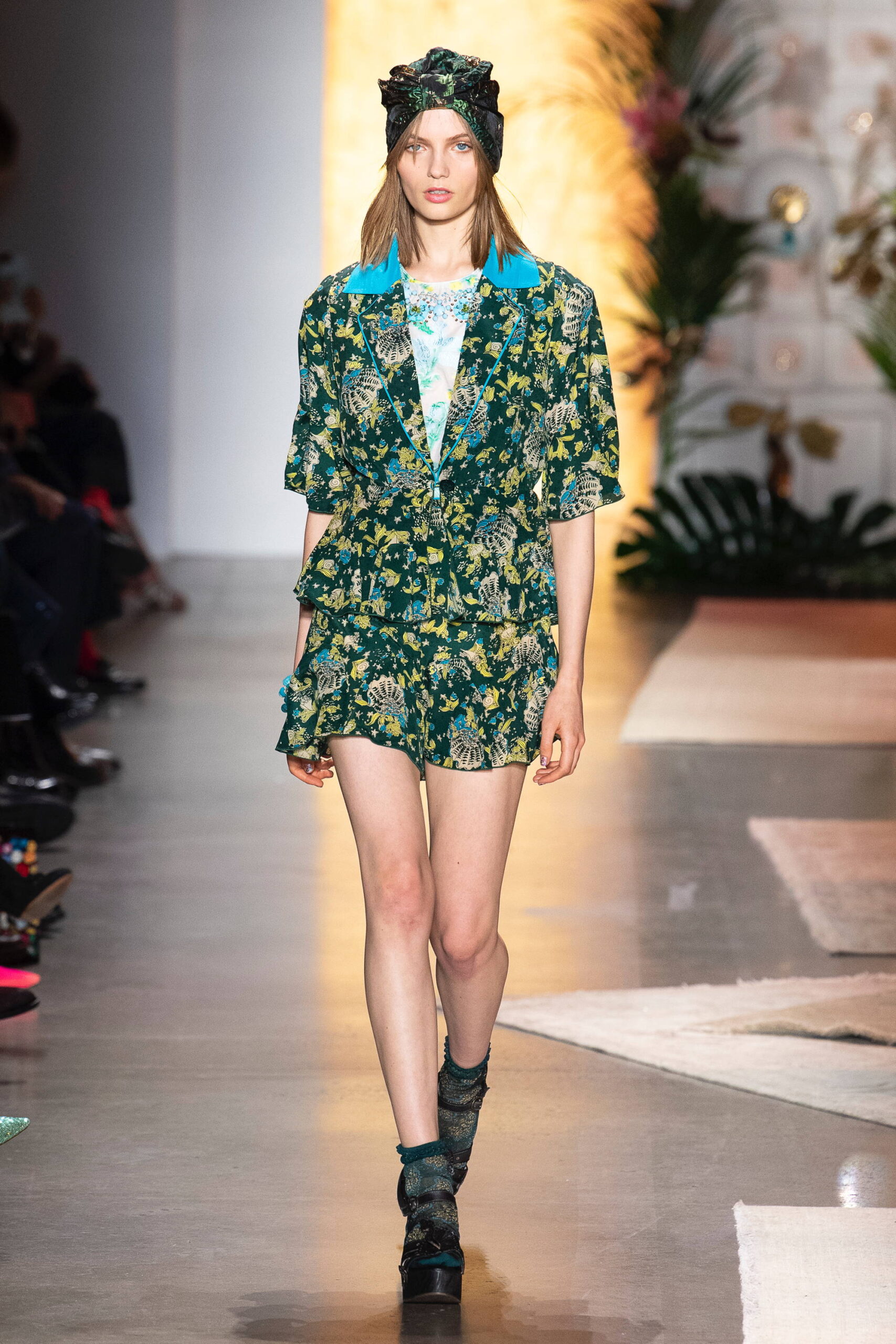 green and blue printed shorts and blazer