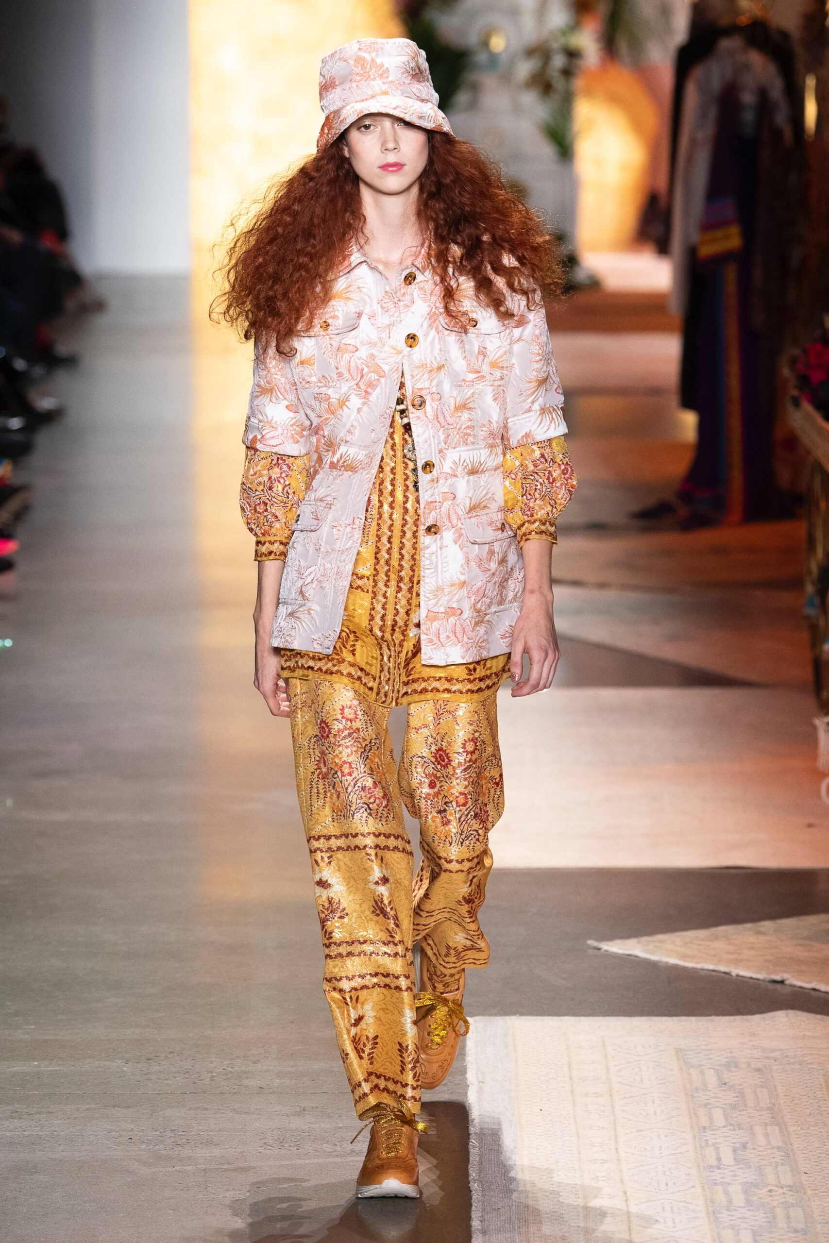 embroidered white jacket with gold pants