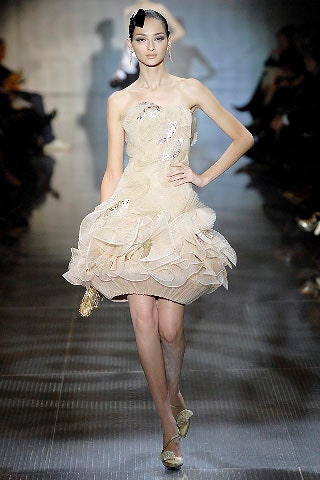 beige silk sleeveless ruffled dress
