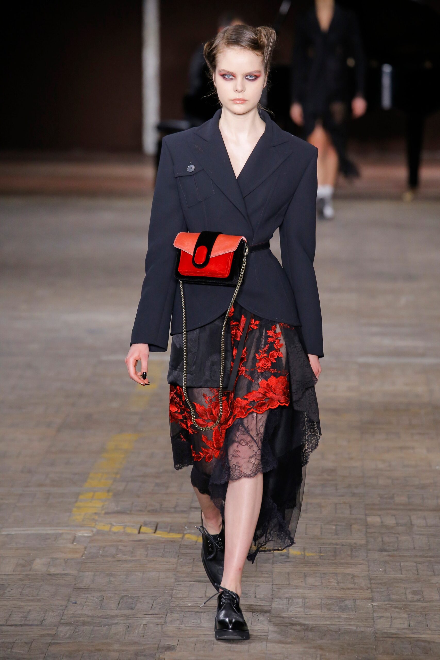 black tailored blazer and layered skirt