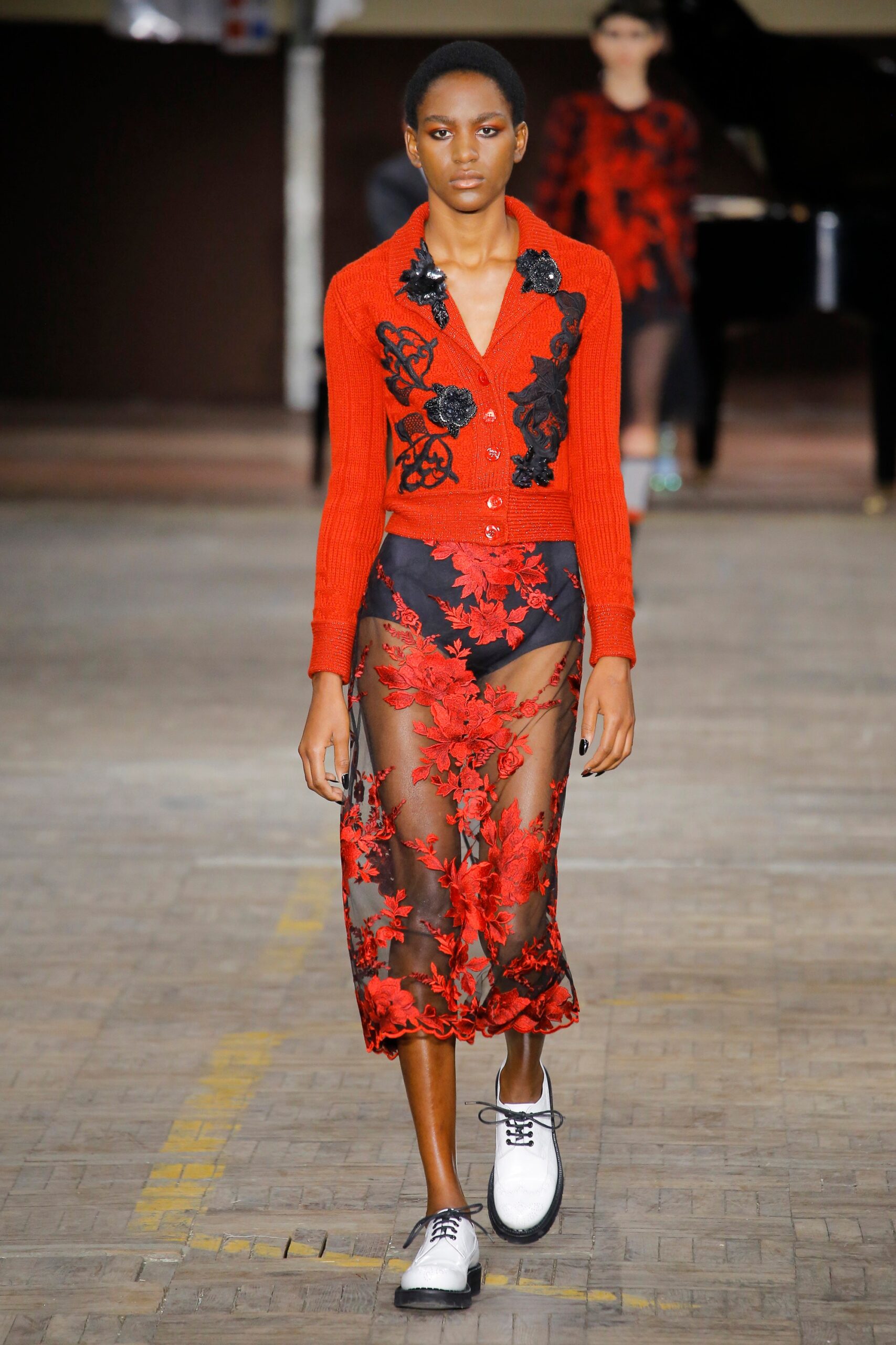 red embroidered top with sheer skirt