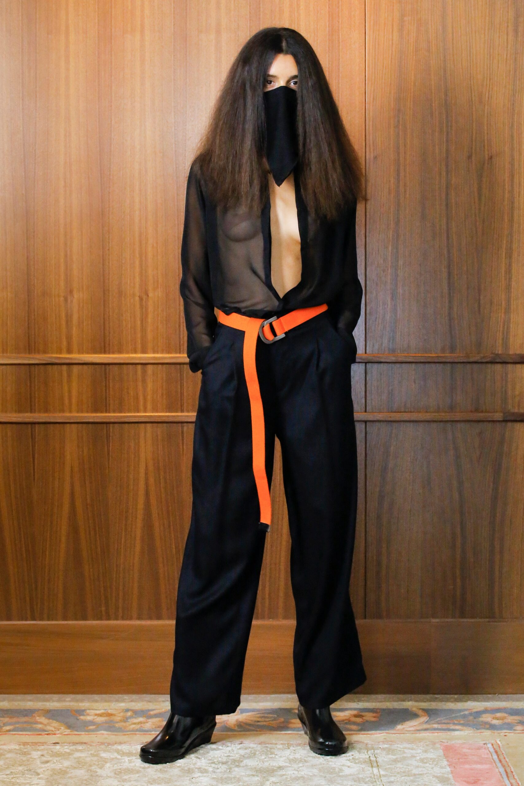 black sheer shirt with wide-leg pants