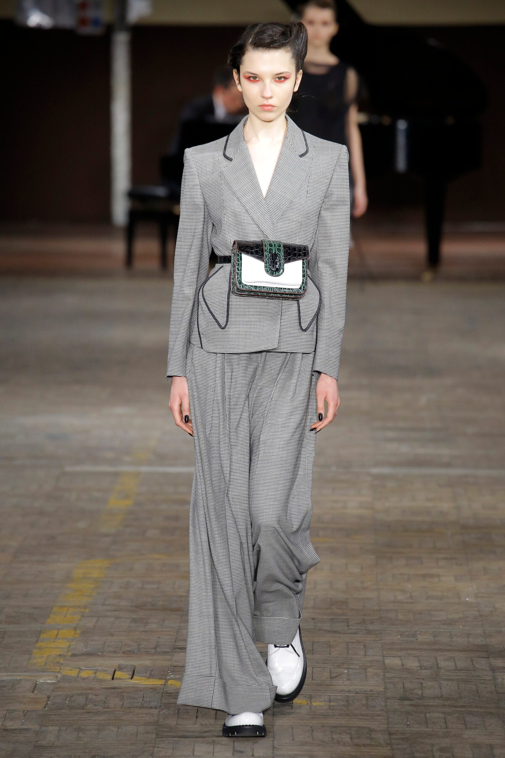 gray tailored suit with belt