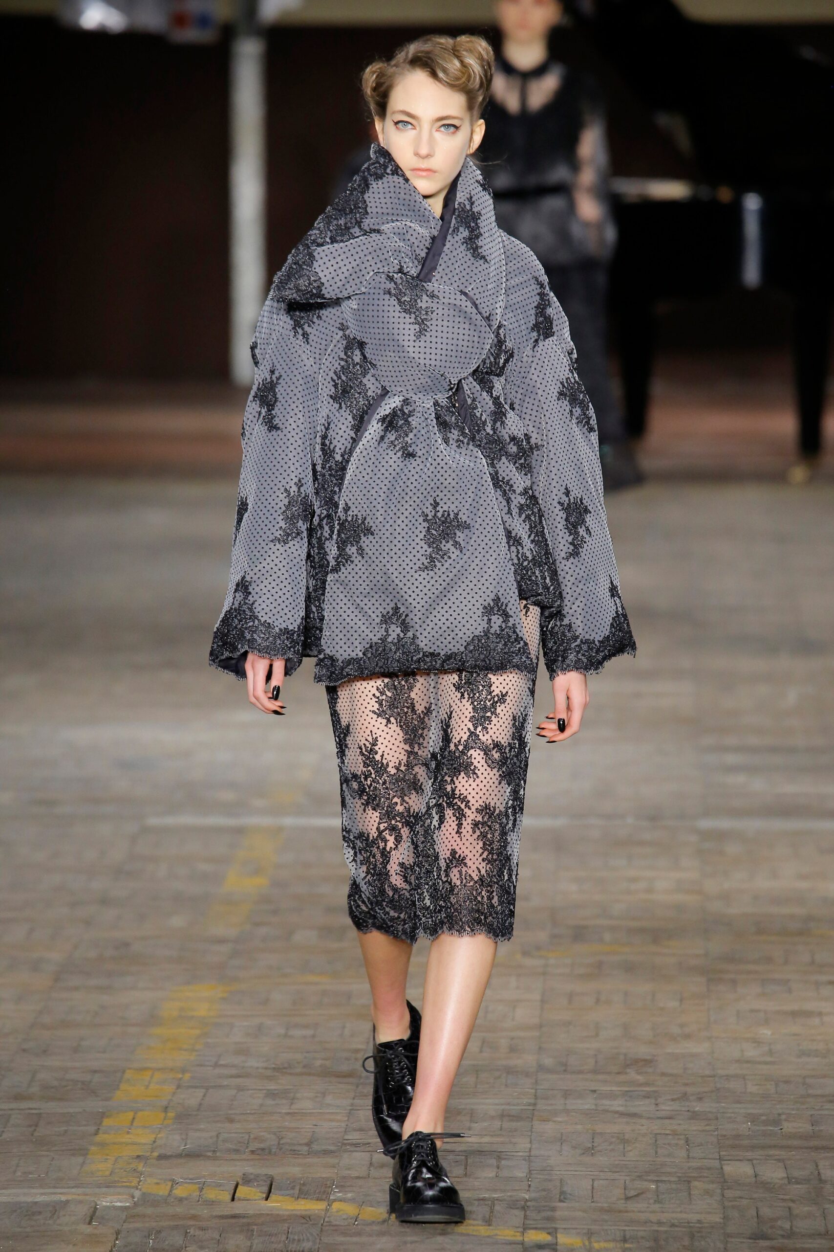 black cotton long-sleeve collared oversized layered coat