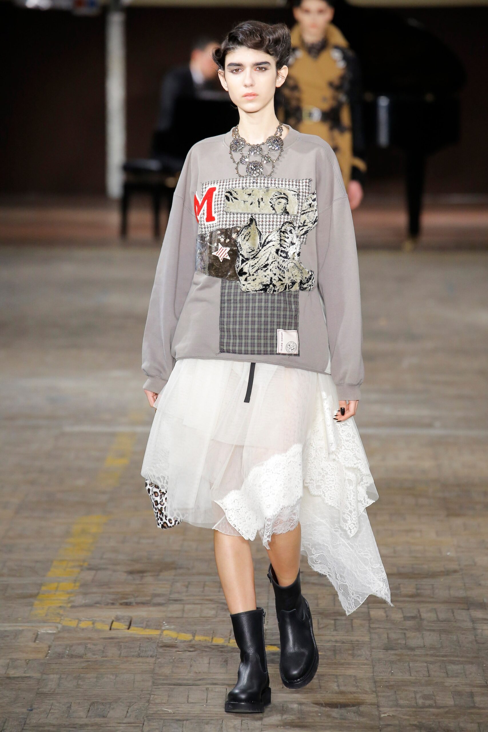gray relaxed sweater with white lace skirt