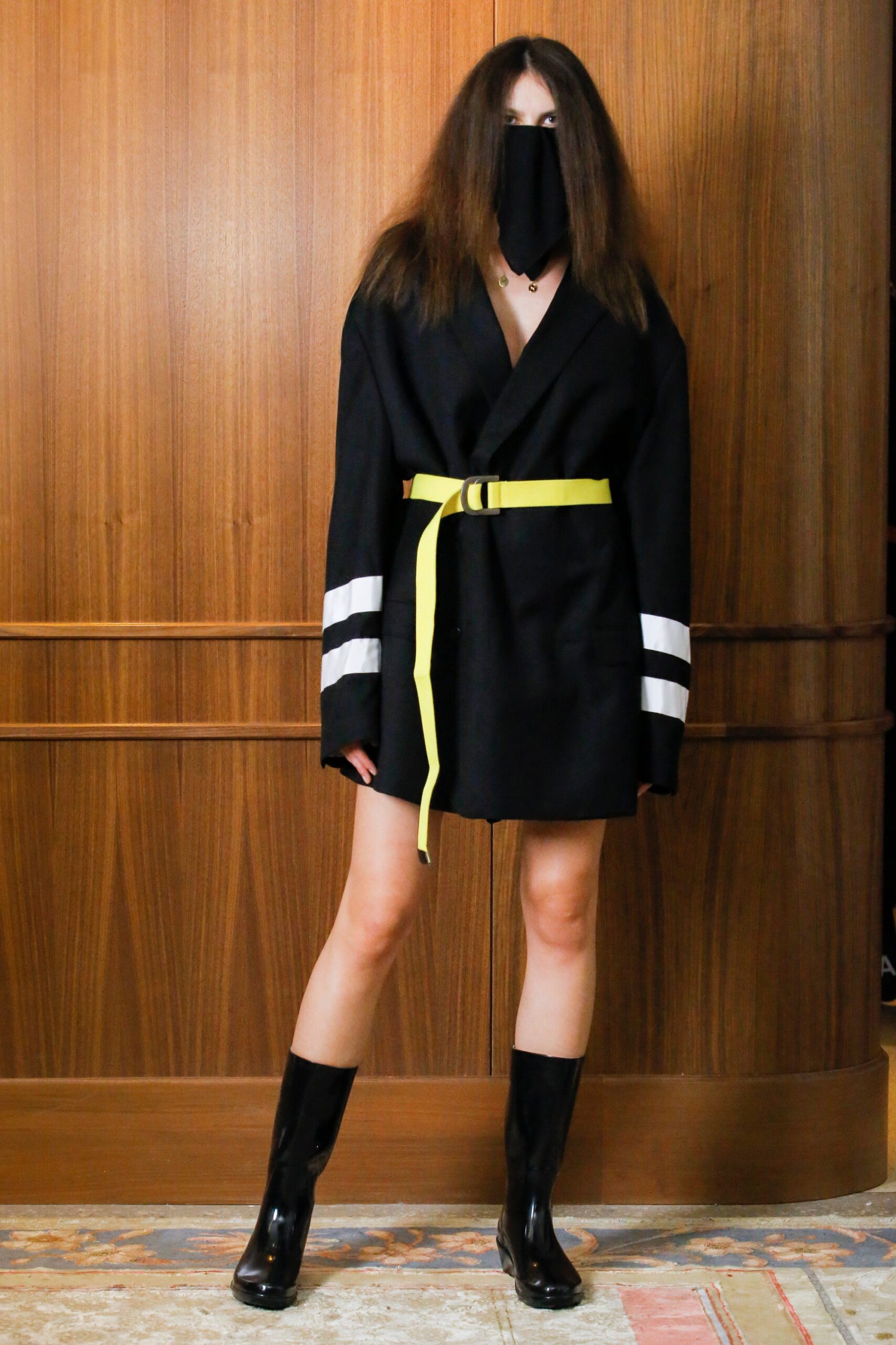 black fitted blazer with yellow belt