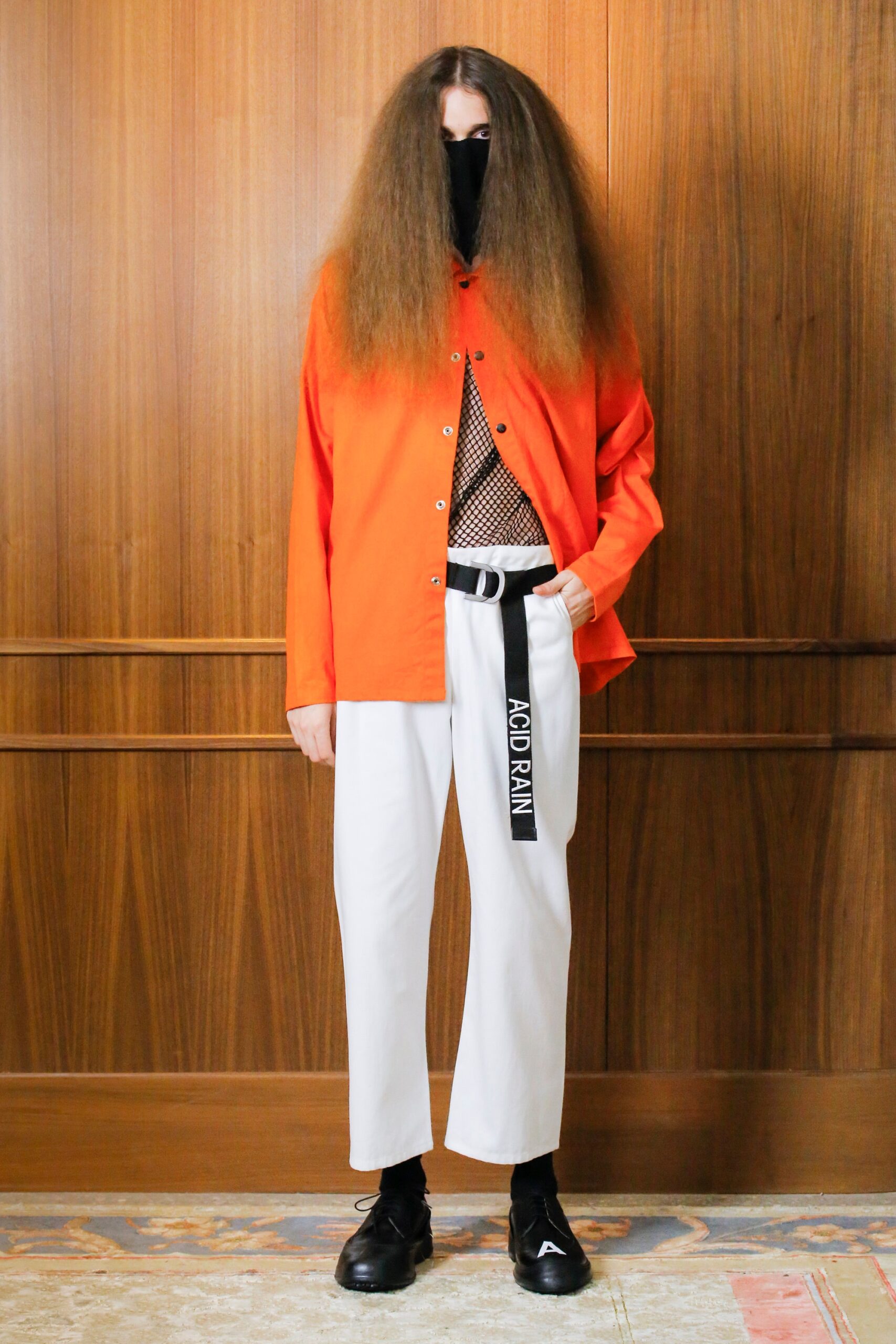 orange shirt white pants outfit