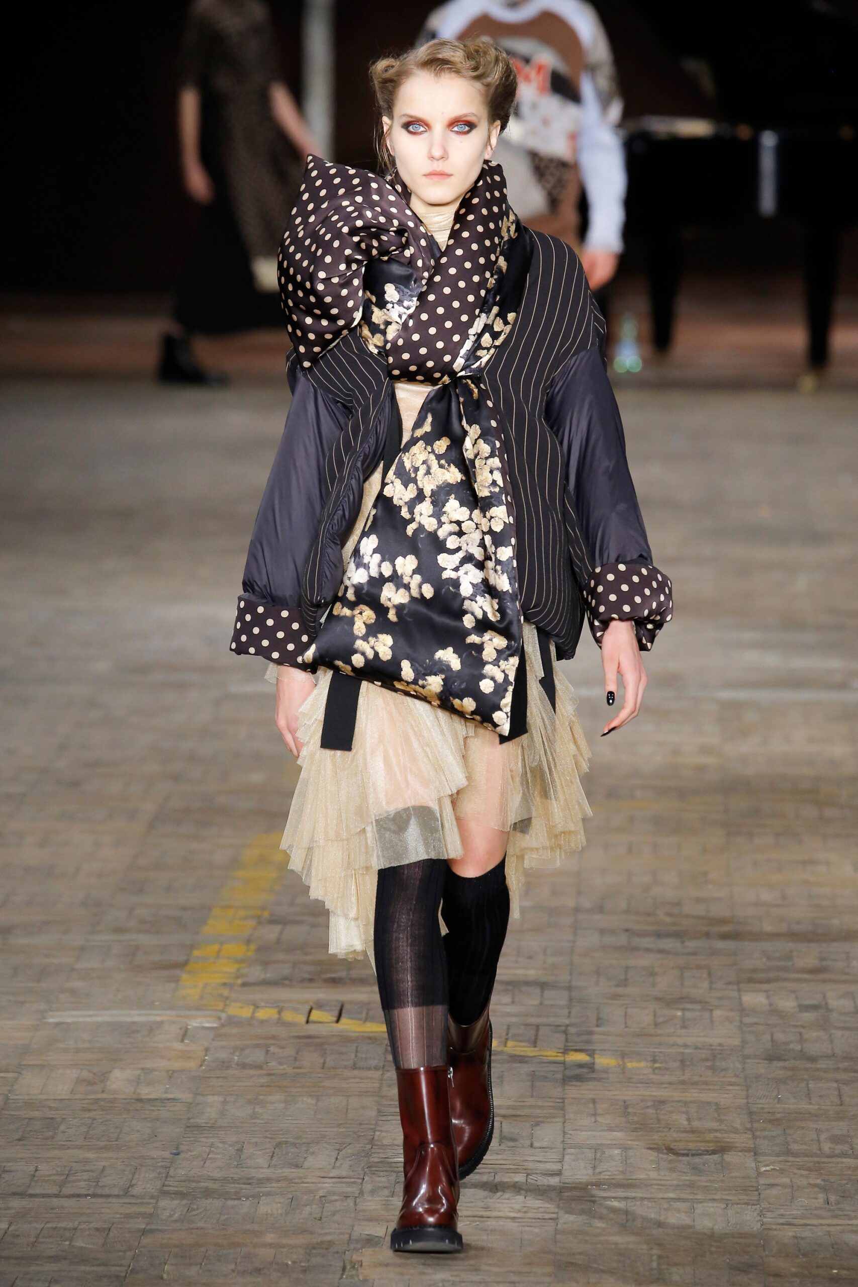 black and white relaxed jacket with beige mini skirt