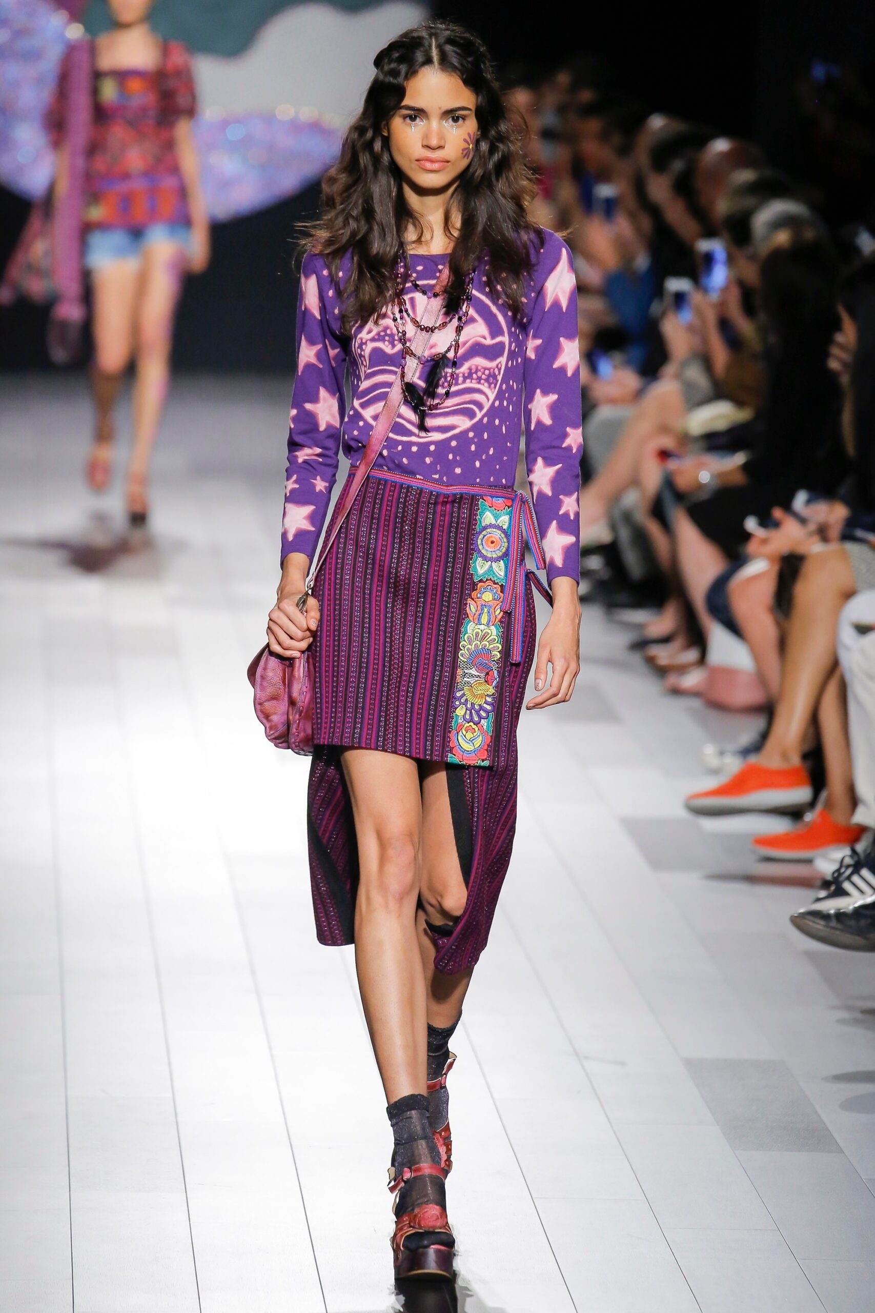 purple printed top with asymmetric skirt