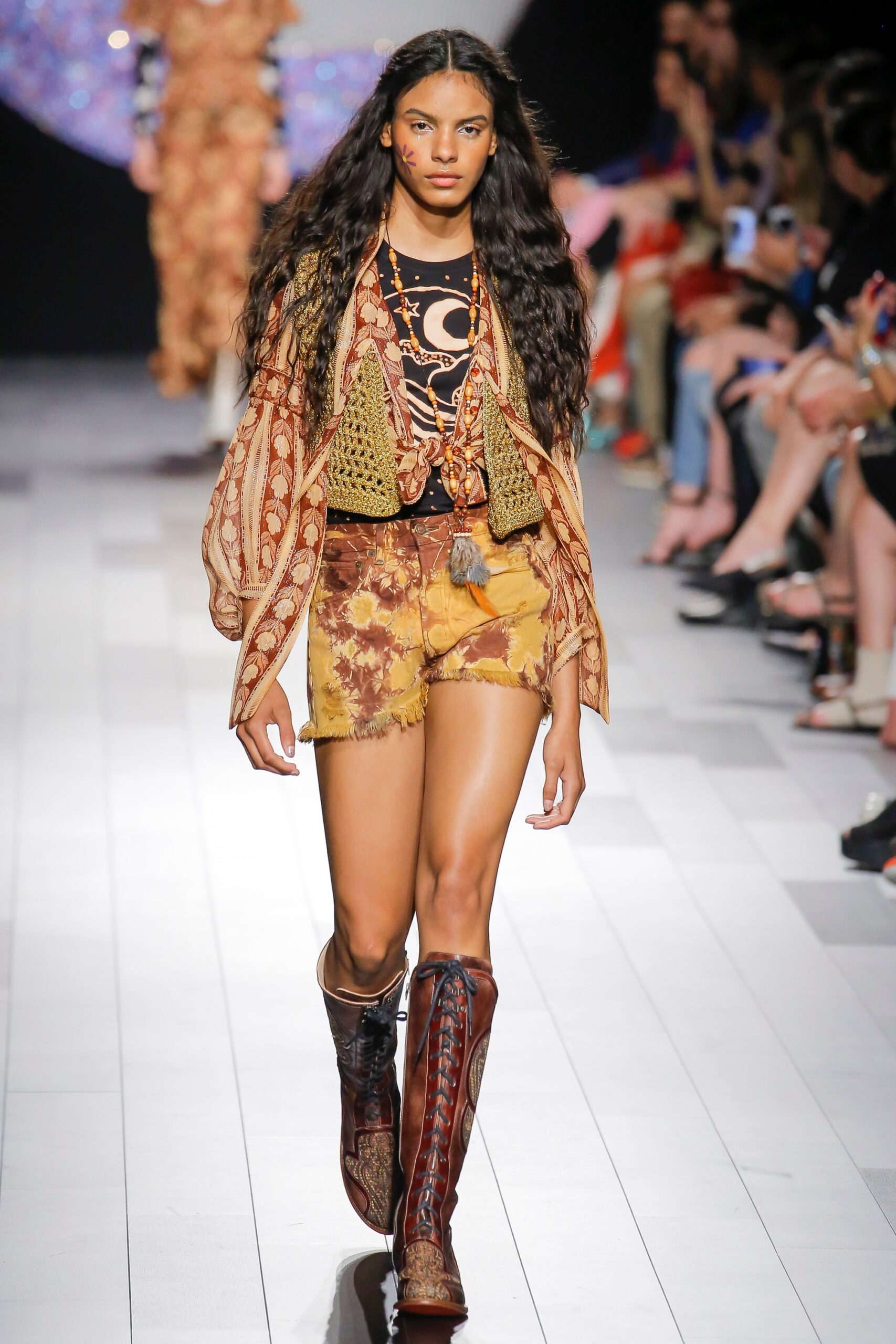 embroidered relaxed top with distressed shorts