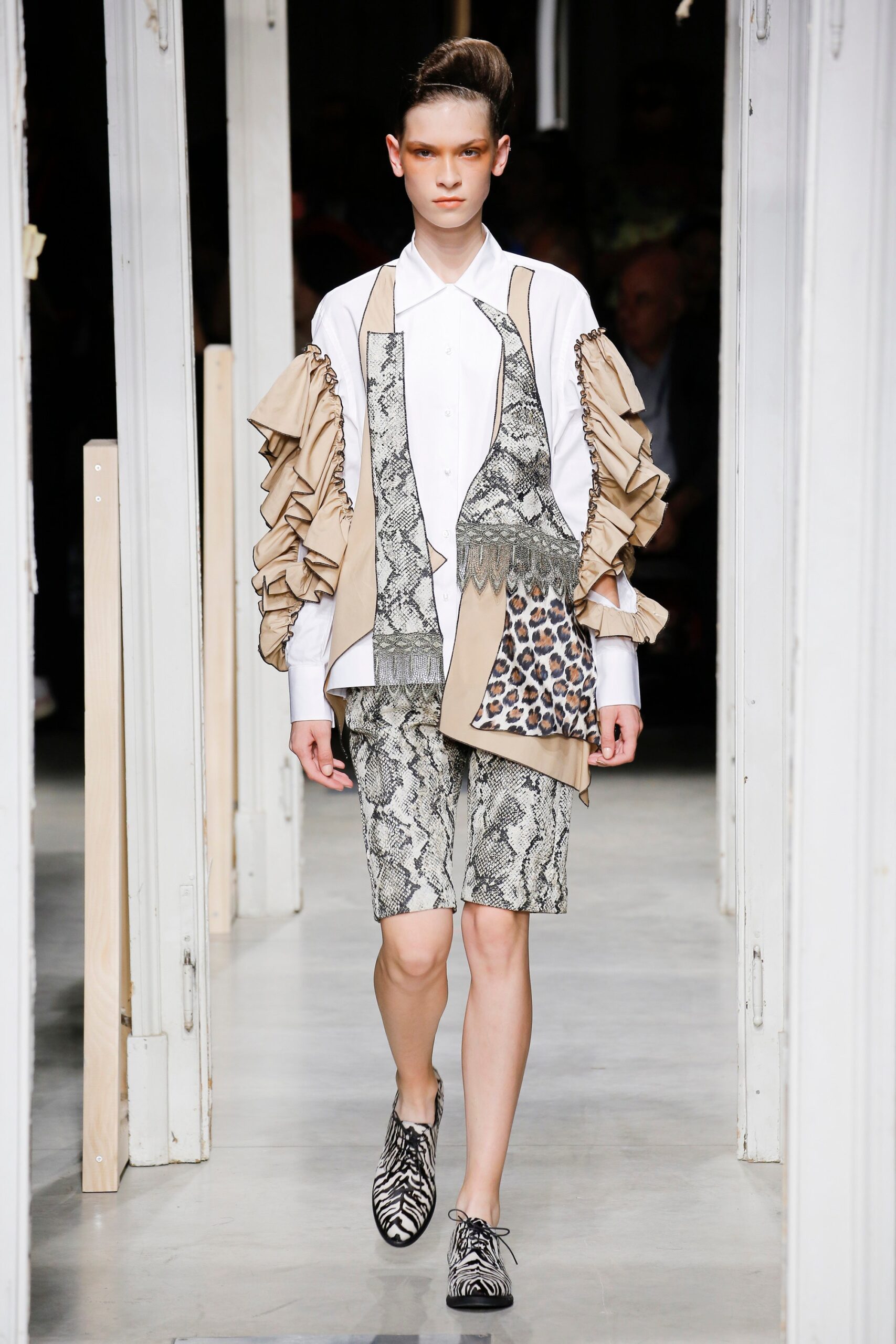 beige sleeveless relaxed ruffled jacket
