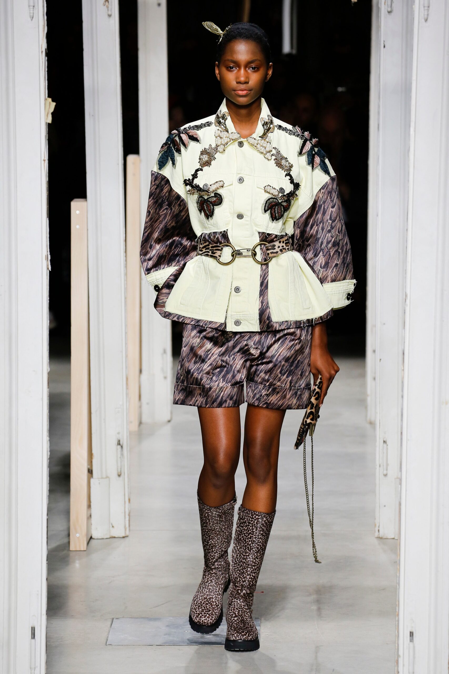 beige embroidered jacket with purple shorts