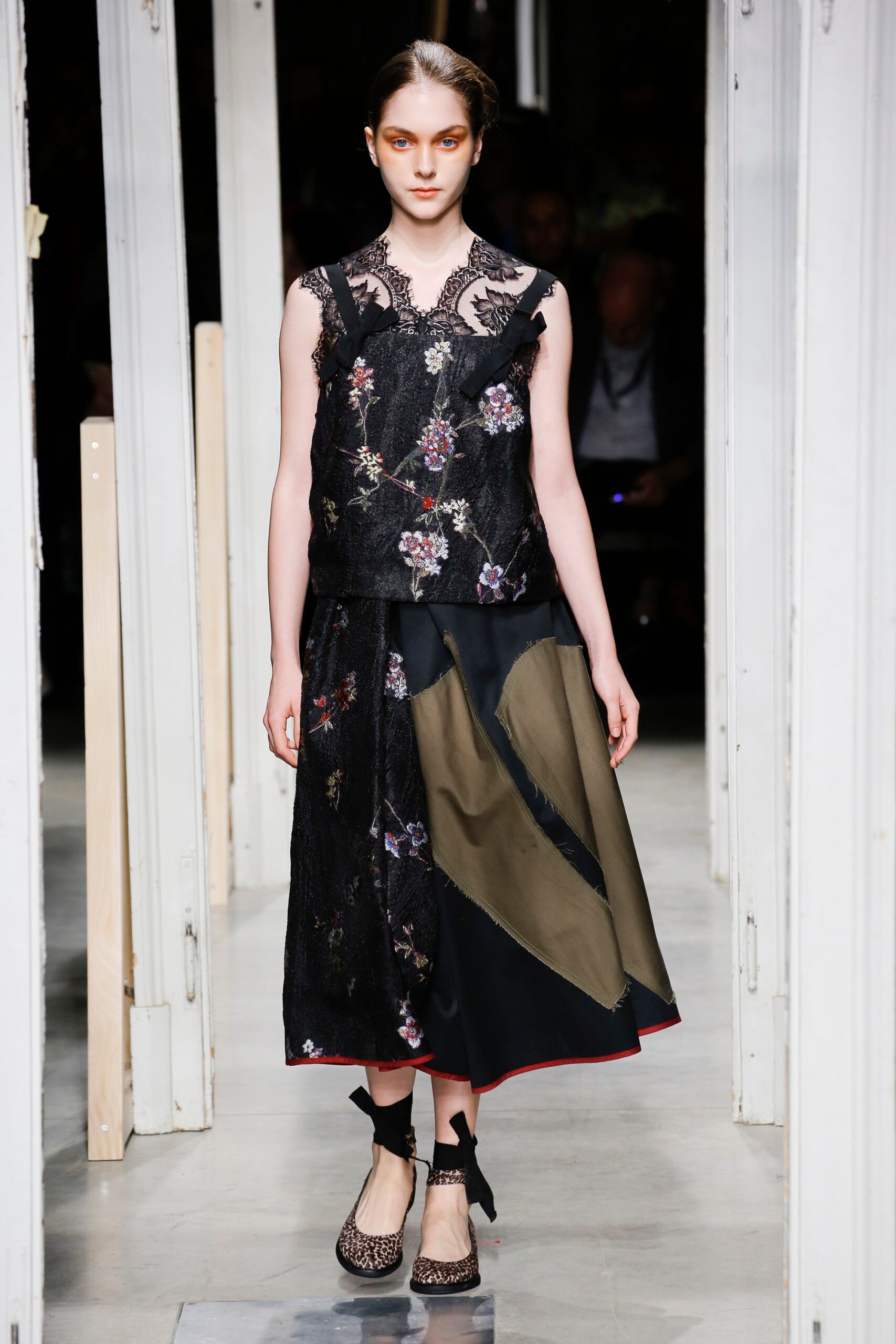 black embroidered silk top and midi skirt