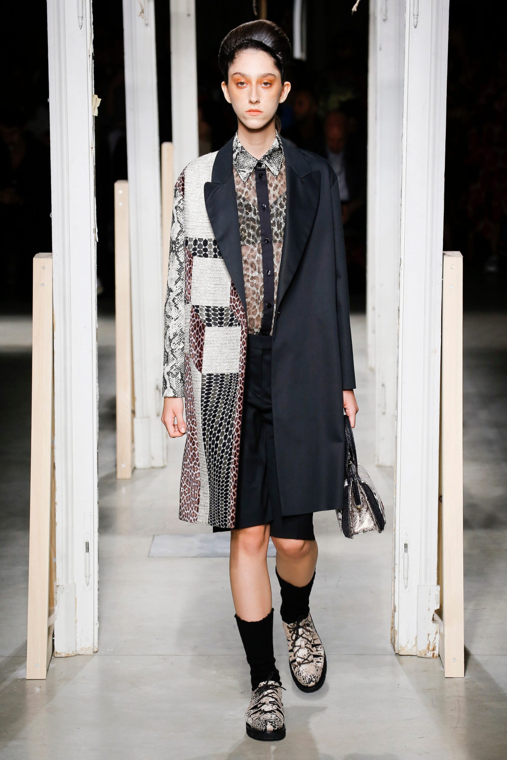 layered black and gray coat