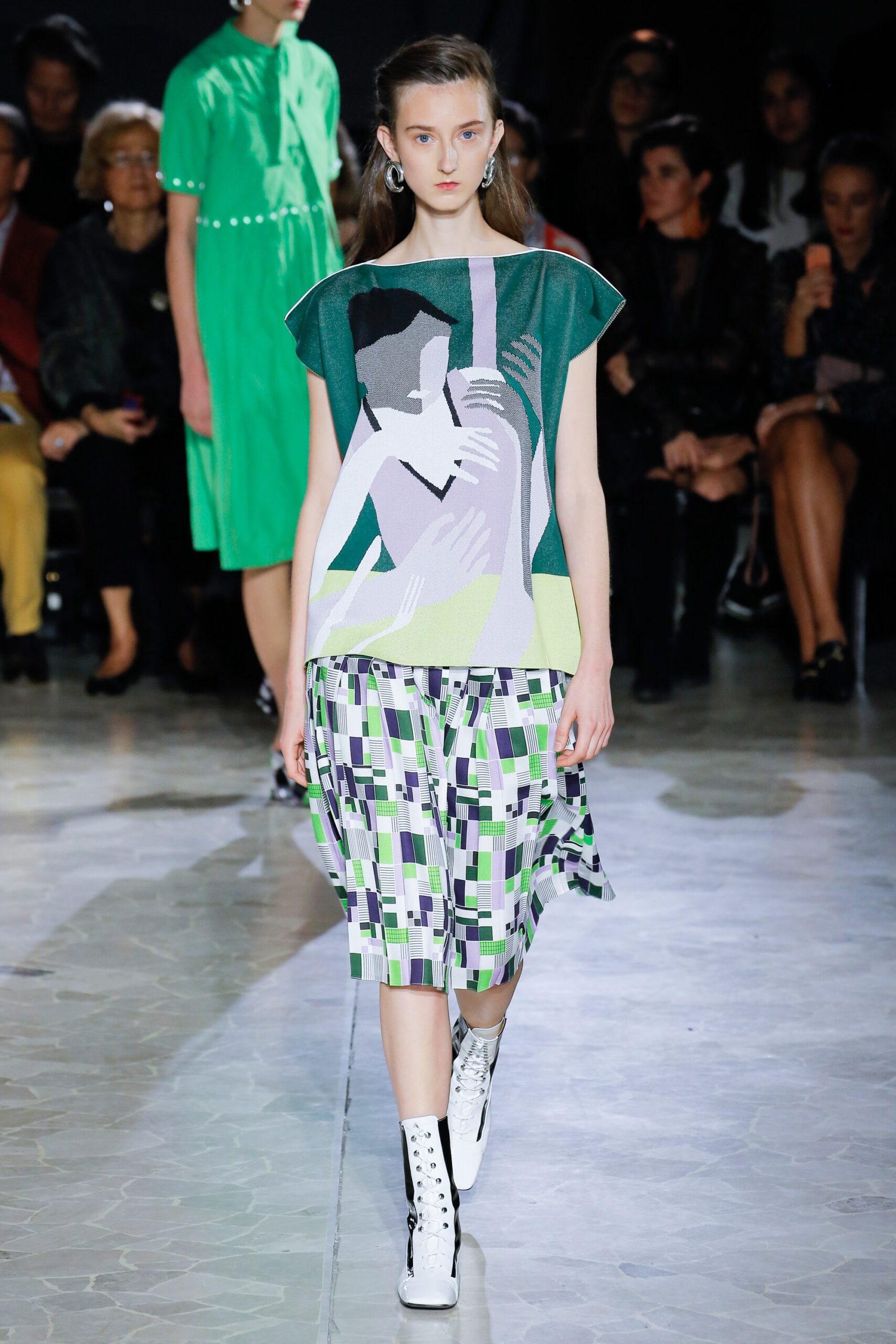 relaxed printed top and pleated skirt