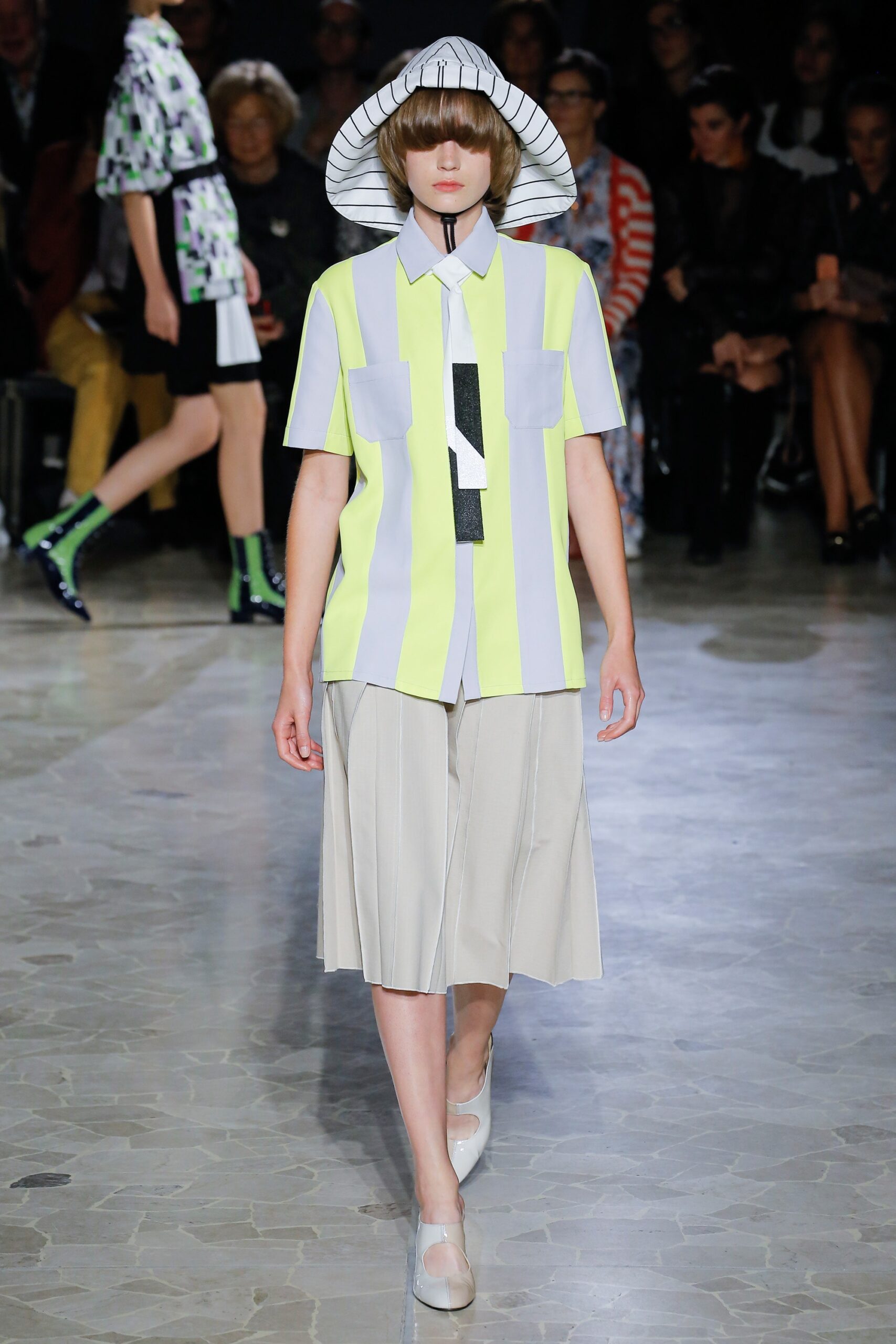 yellow striped shirt with pleated skirt