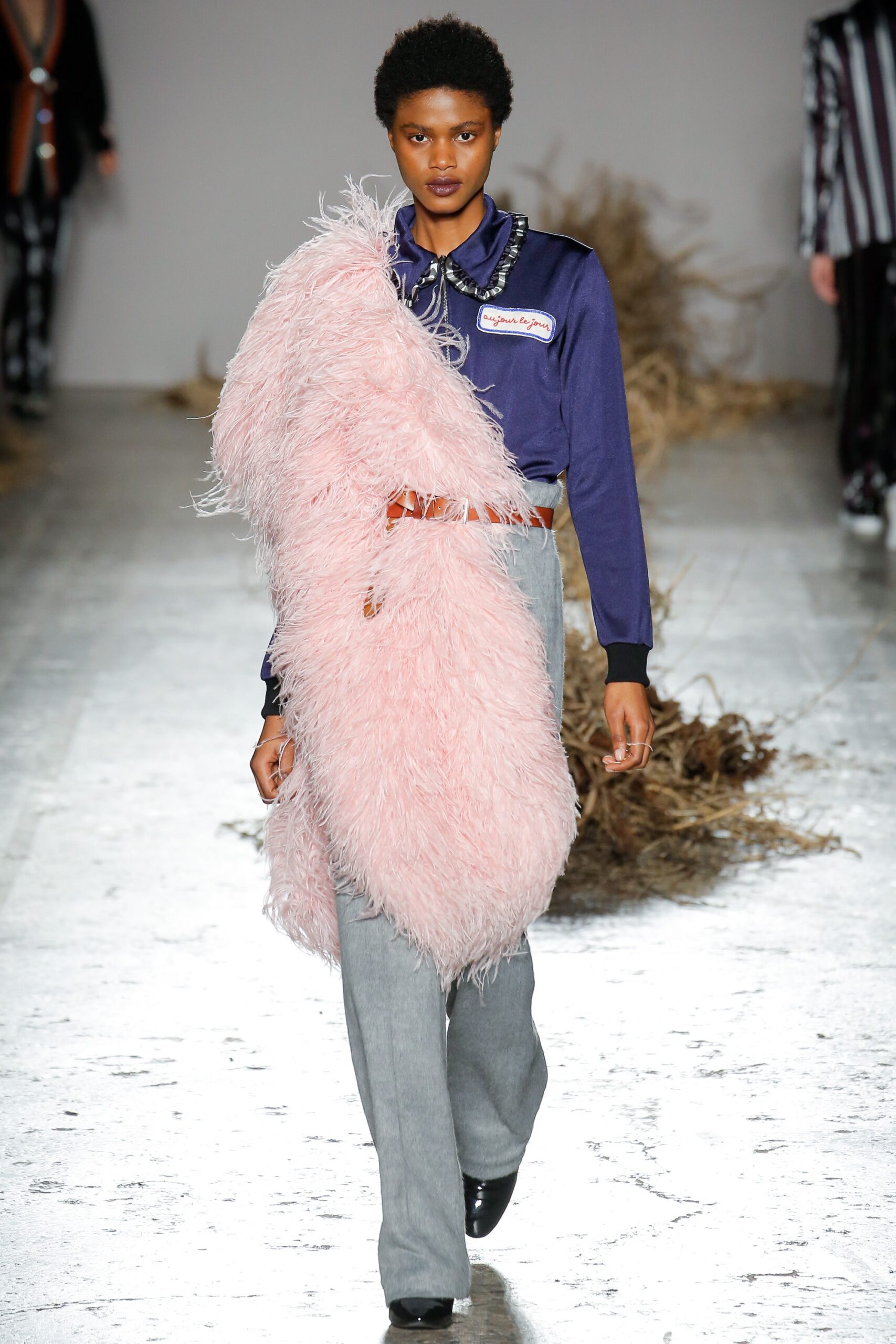 blue fitted top with pink cape