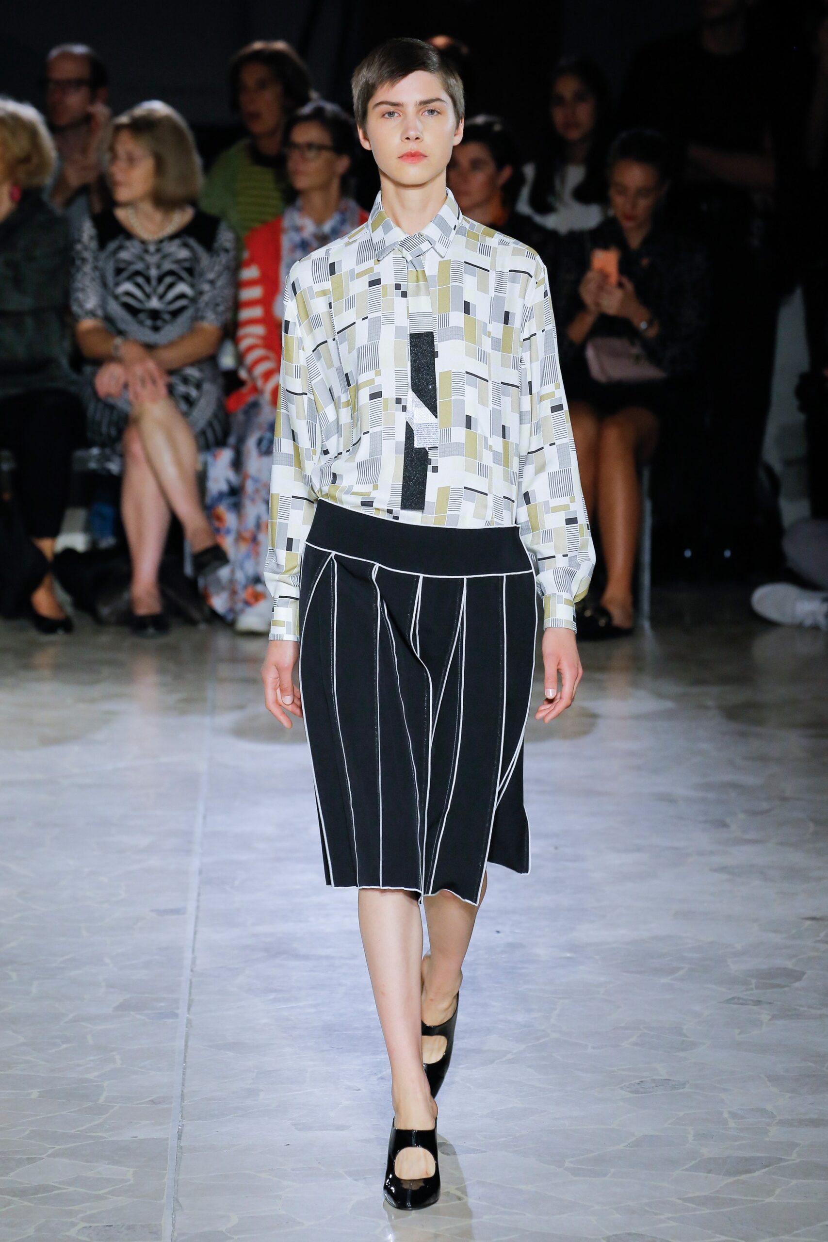 relaxed printed shirt and fitted skirt