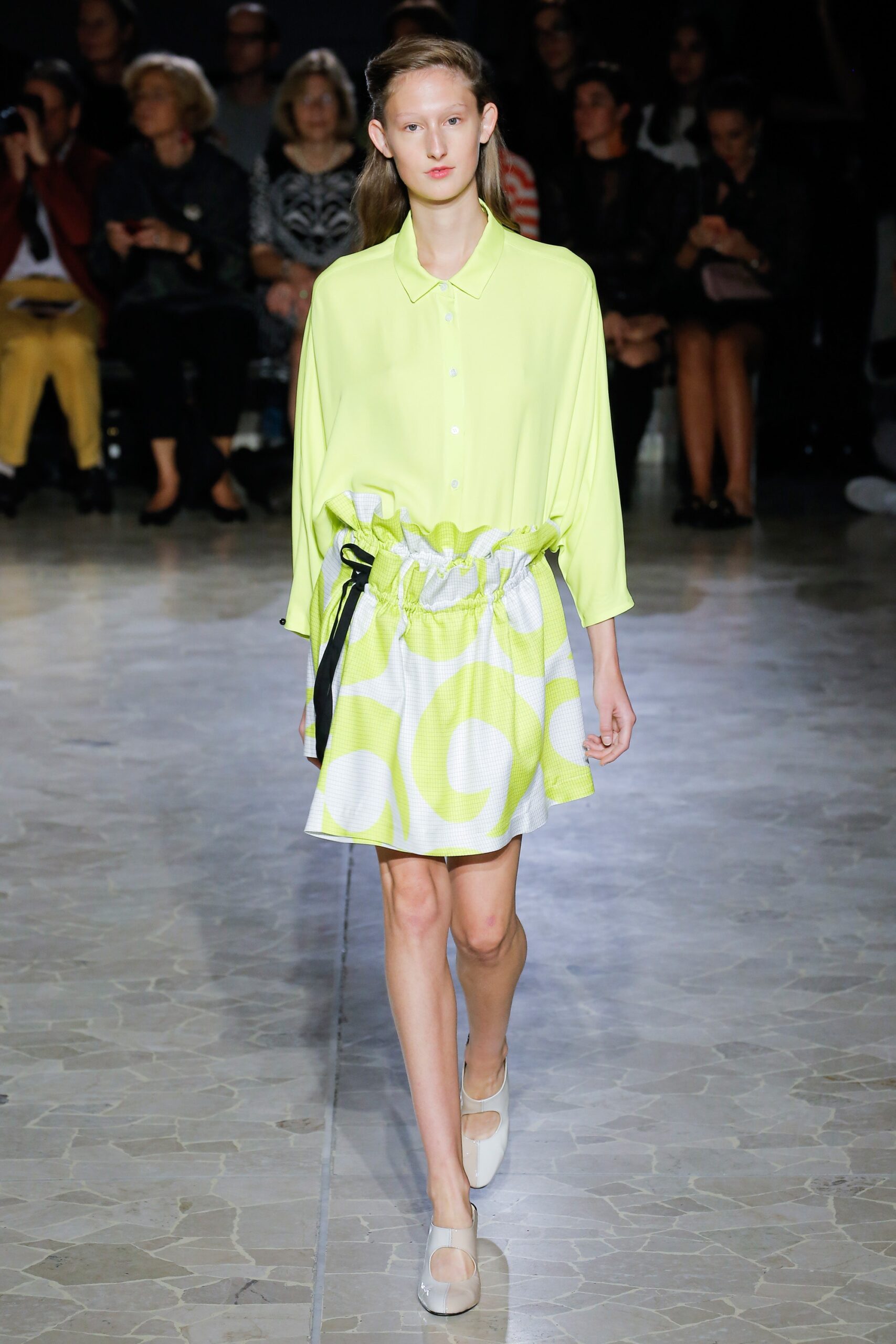 yellow green relaxed shirt and pleated skirt