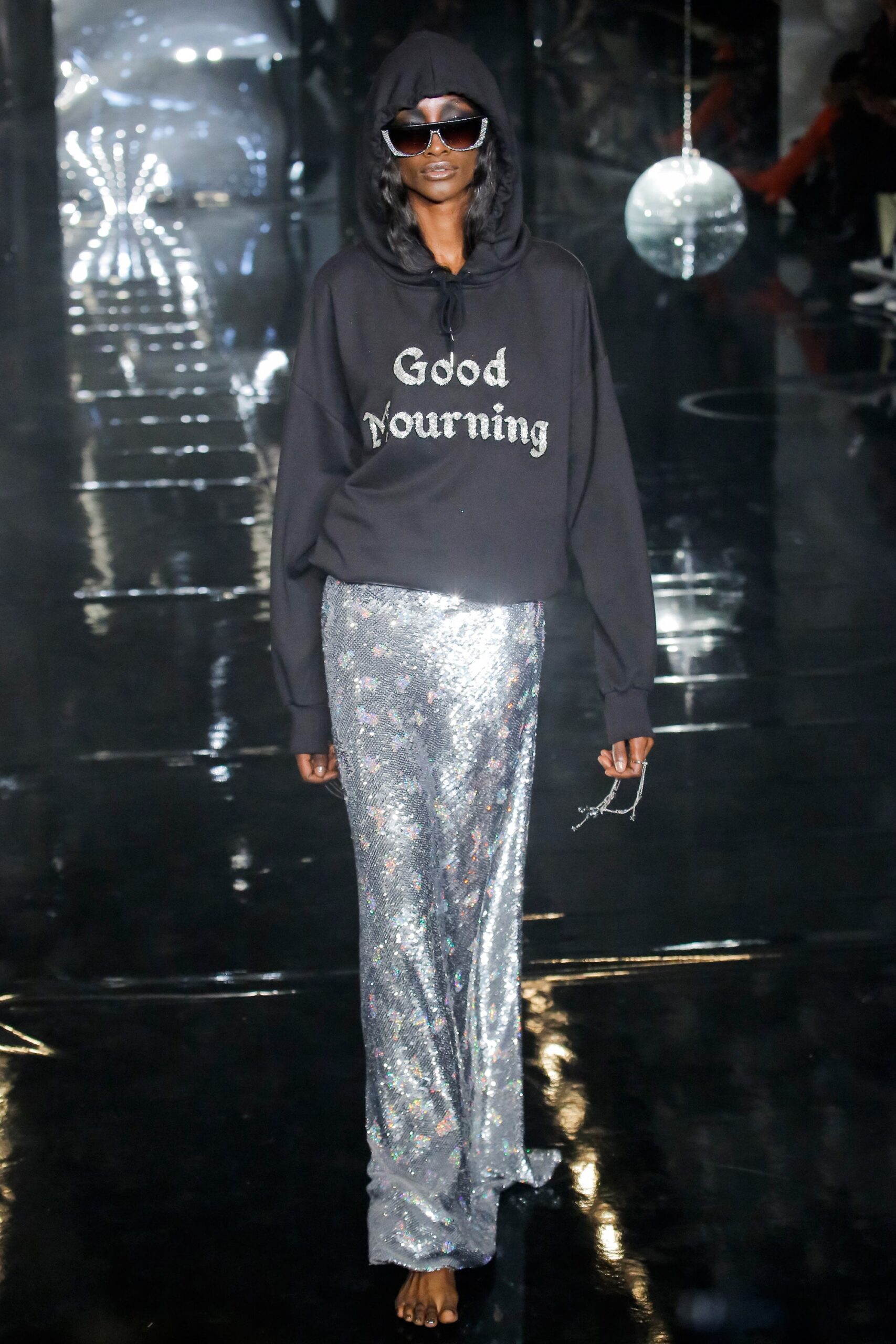 black hoodie and silver sequin skirt