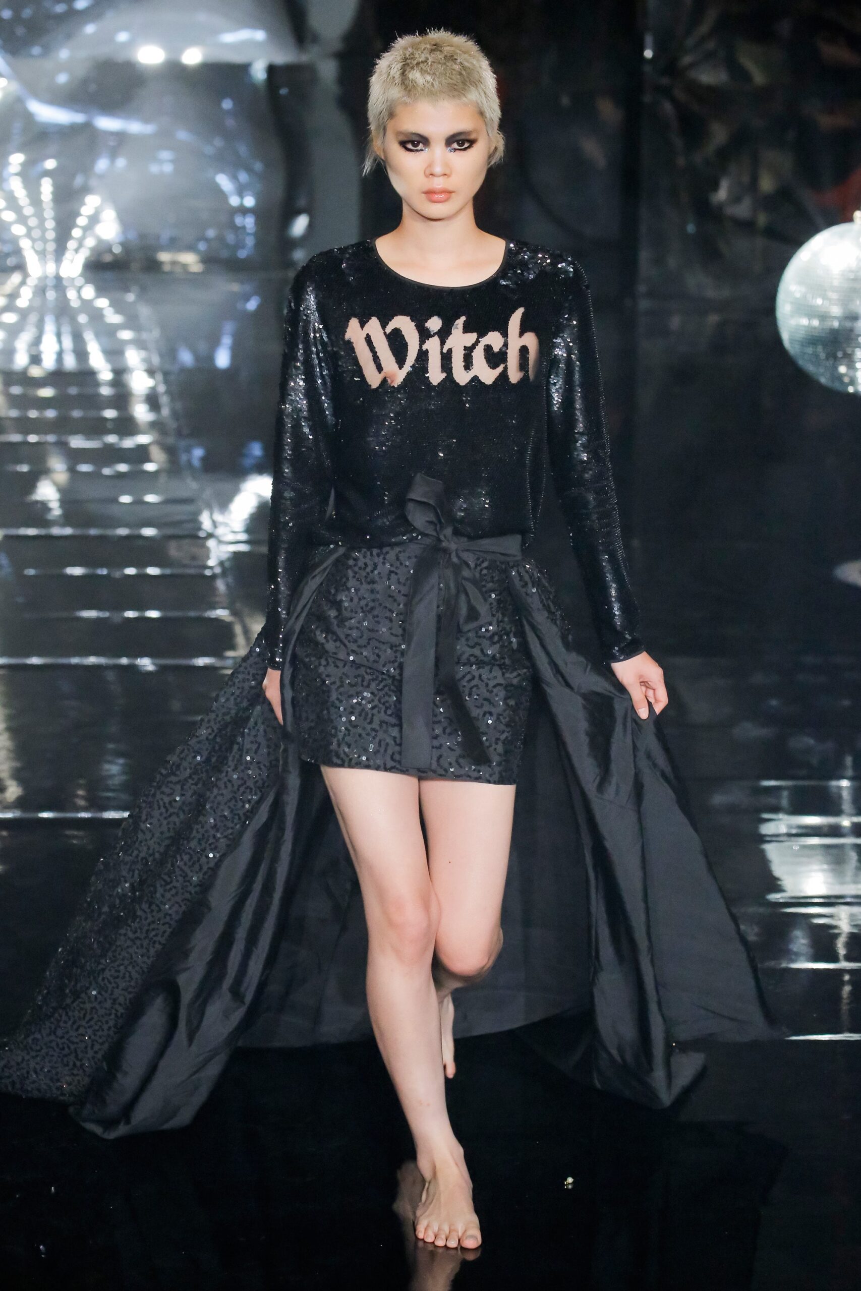 black sequin mini dress with cape