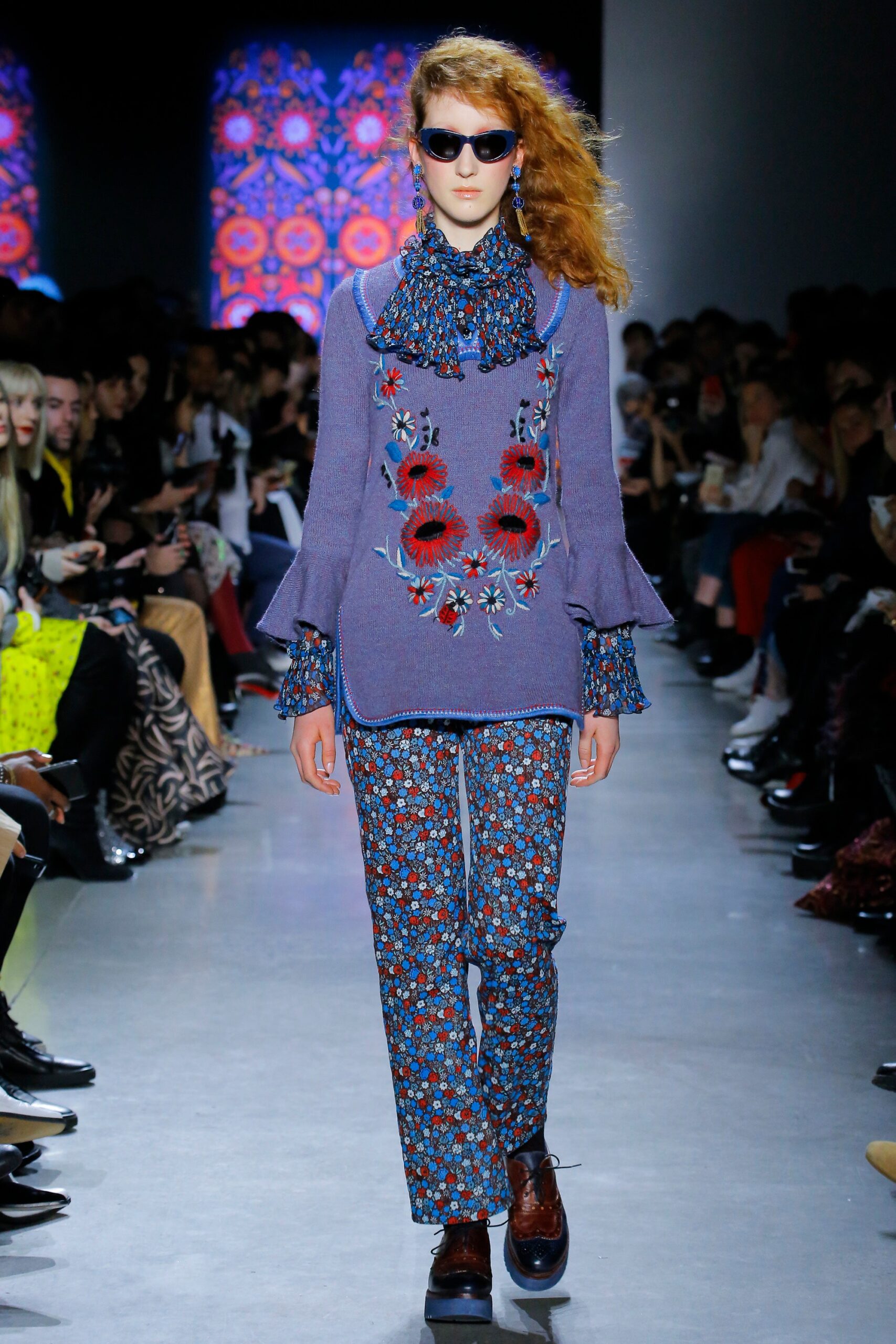 purple embroidered top with flared pants