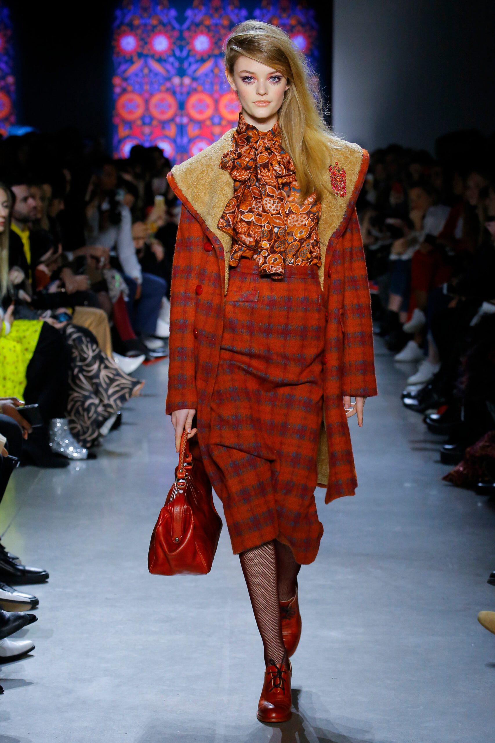 red checked coat and orange dress