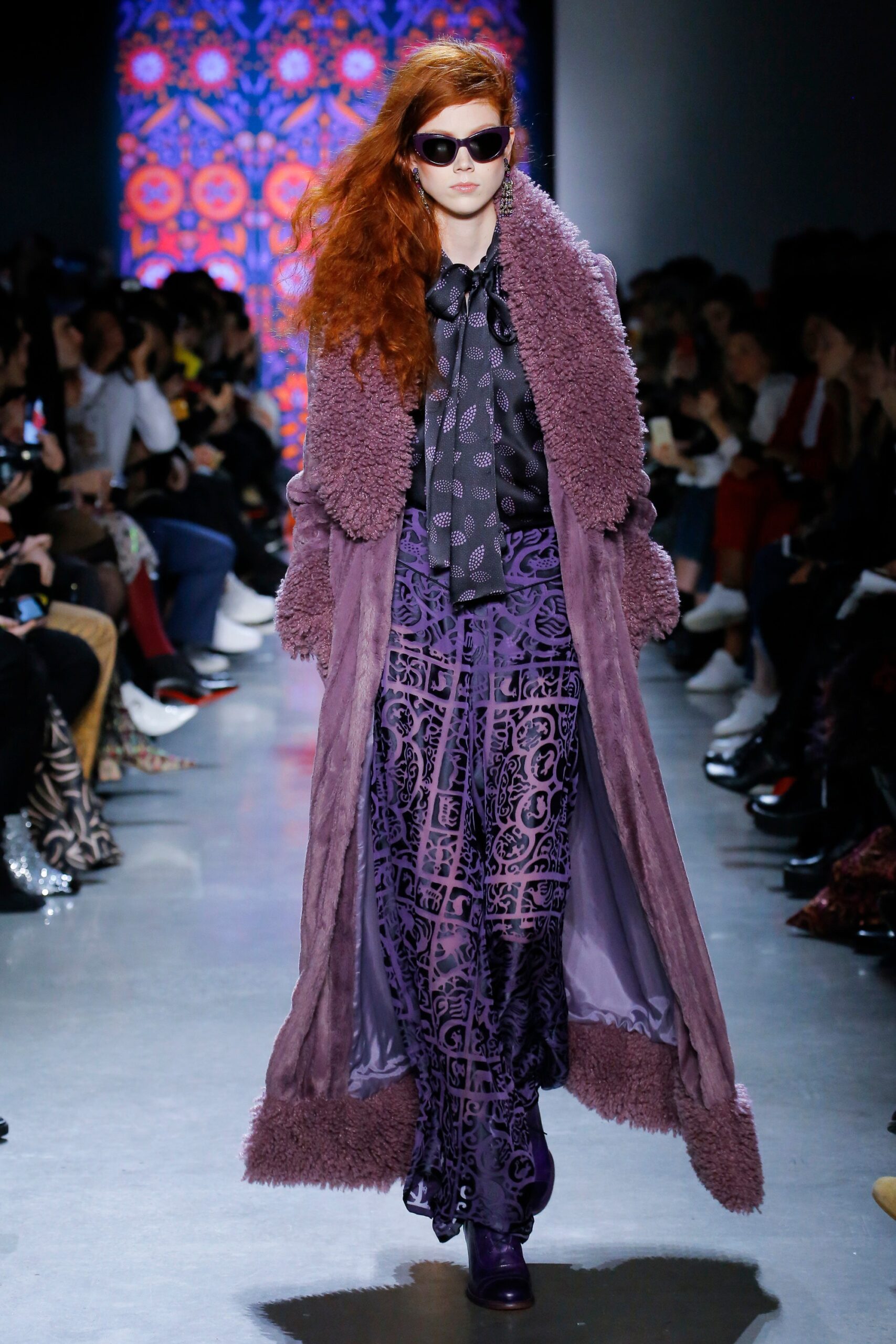 purple faux-fur coat with printed blouse
