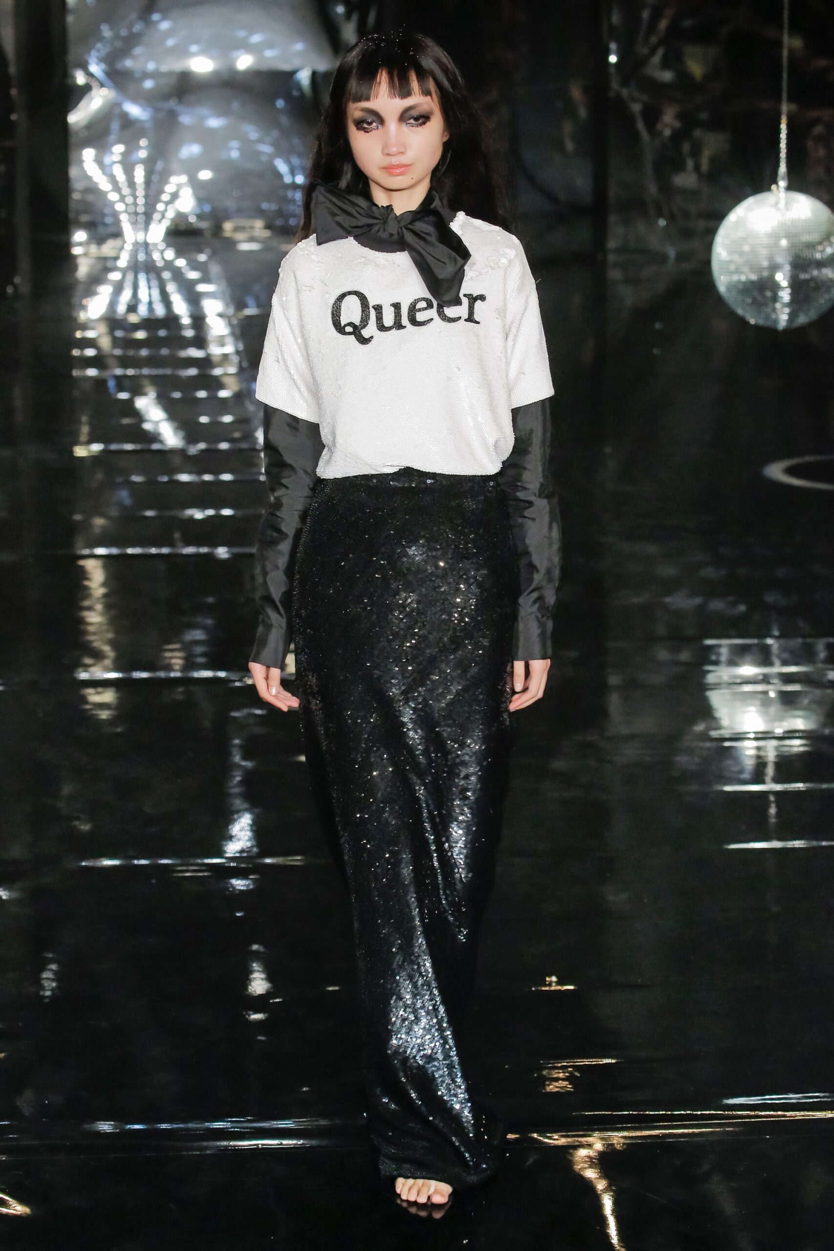 white printed t-shirt and black sequined skirt