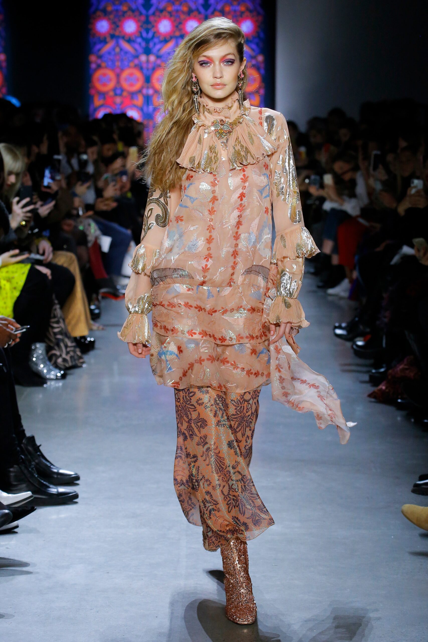 pink embroidered midi dress with gold boots