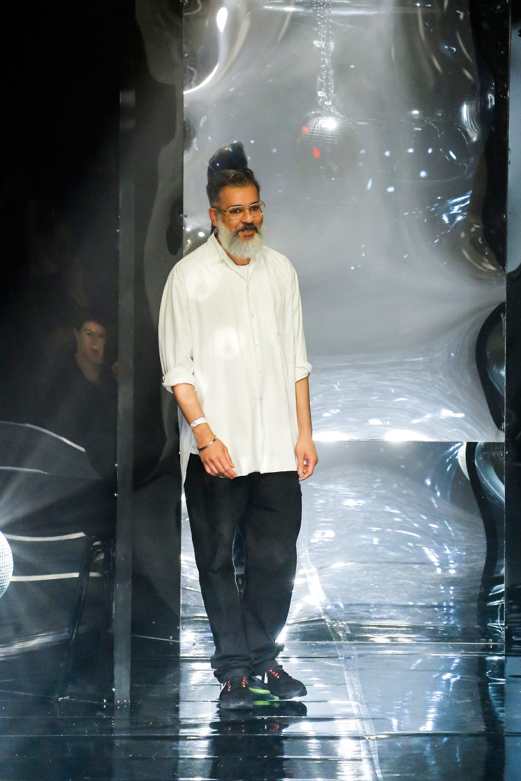 white relaxed shirt and black pants