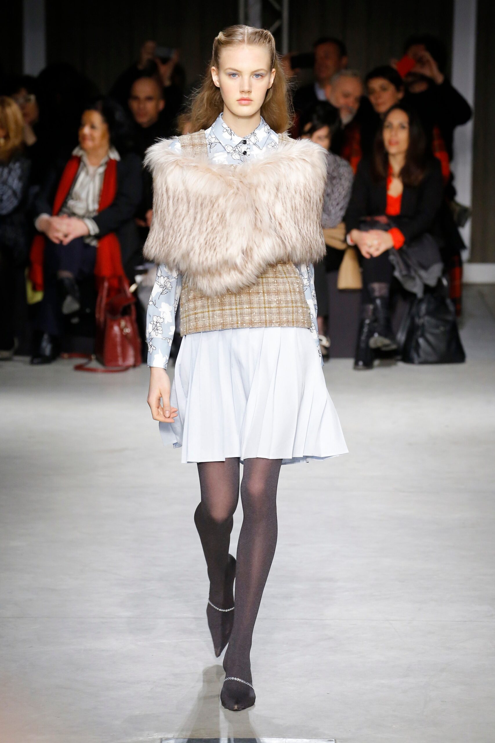 light blue pleated dress with fur cape