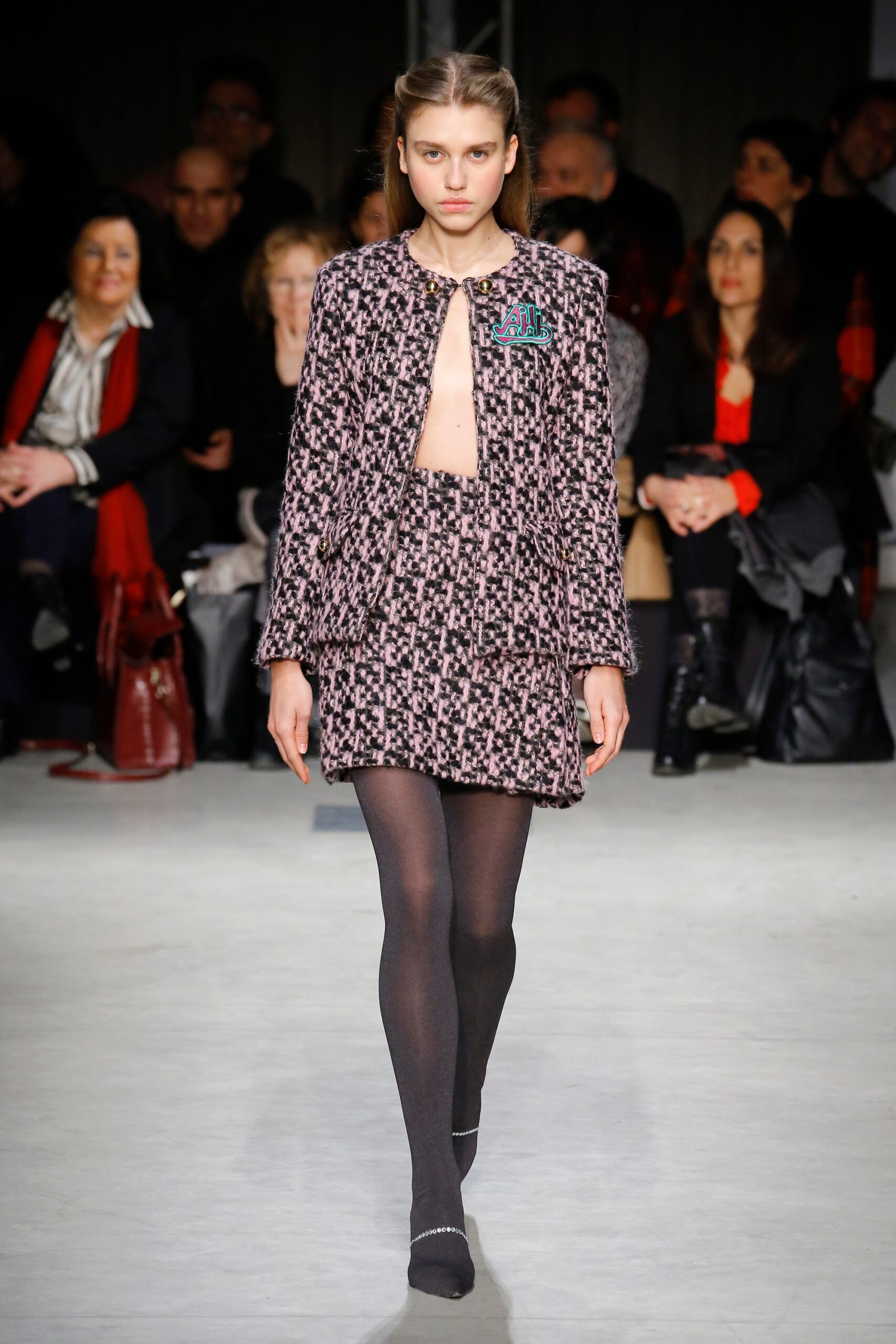 pink tweed fitted jacket and mini skirt