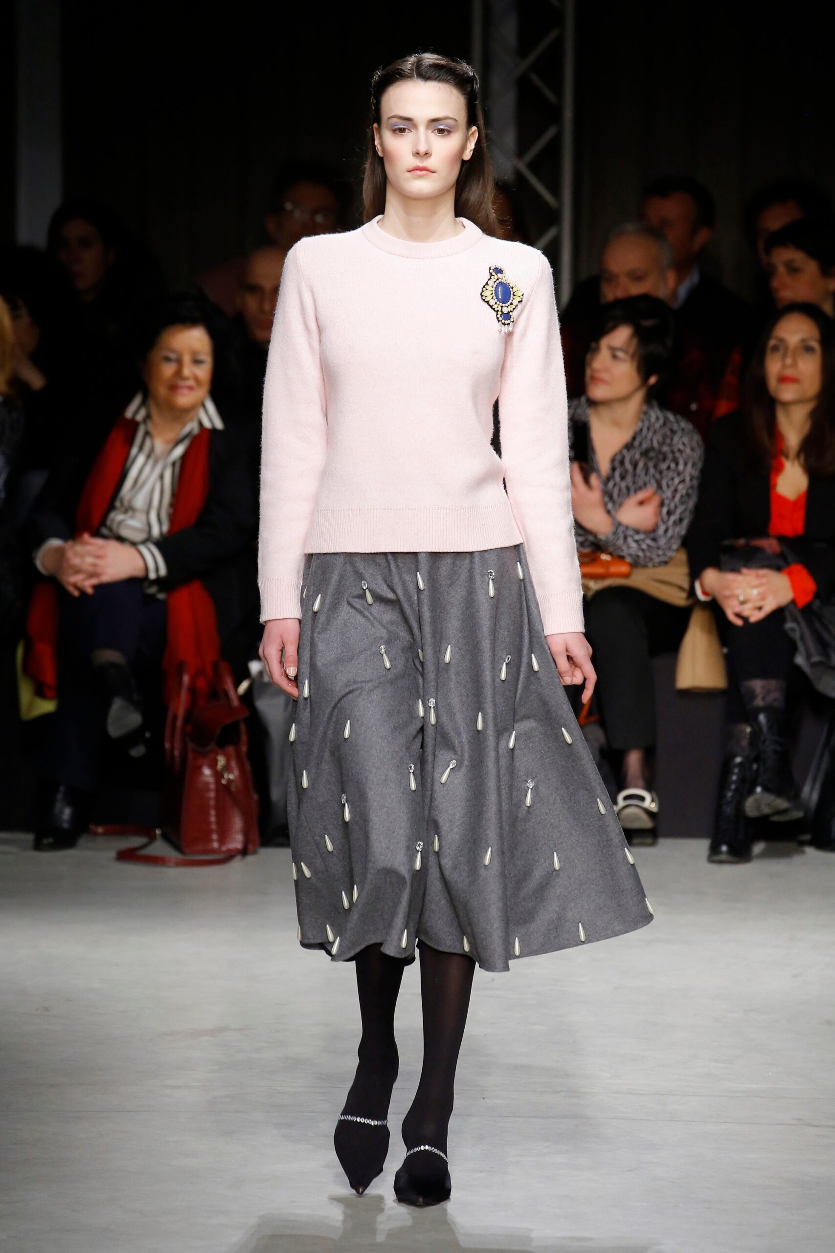 pink wool fitted sweater and gray midi skirt