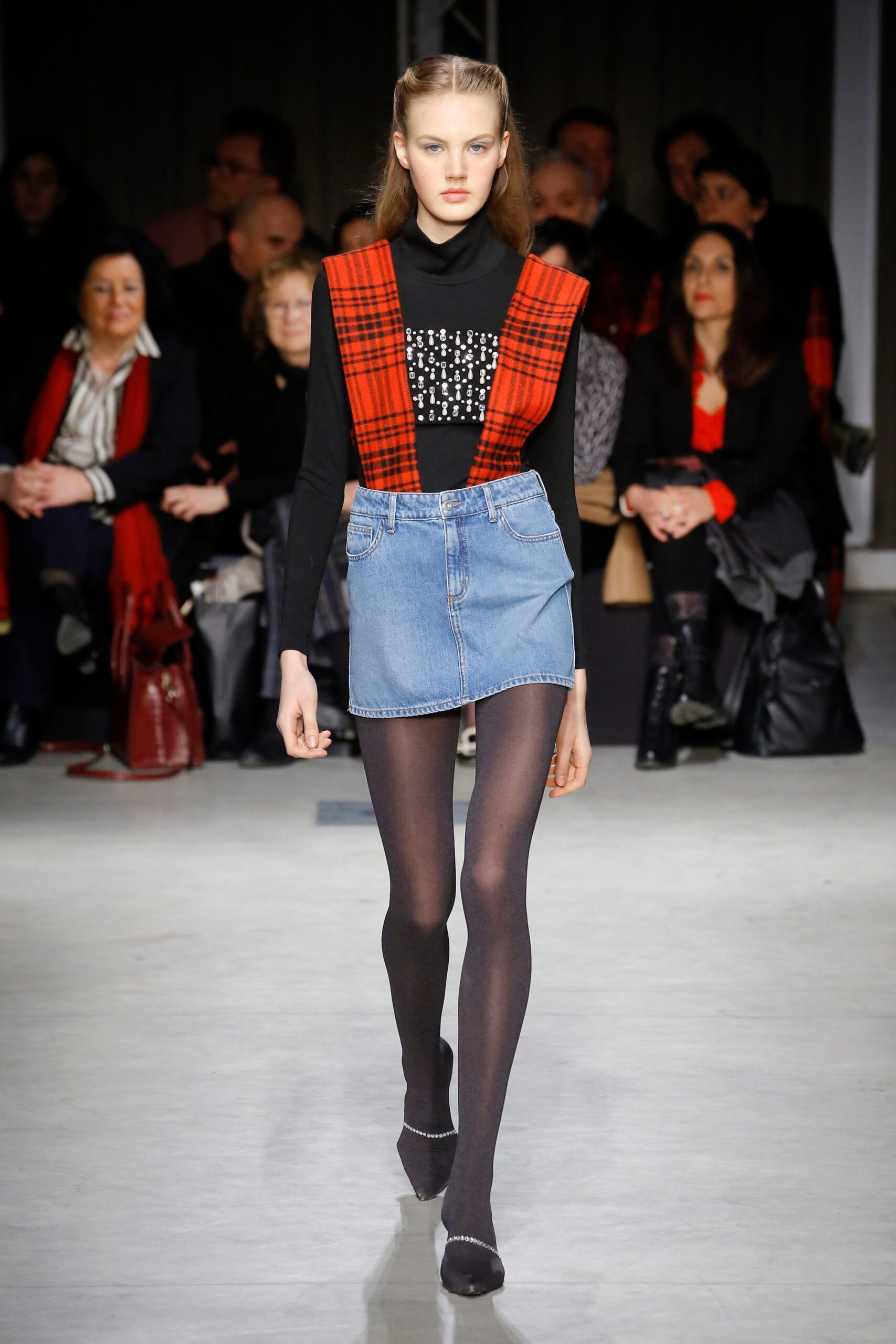 black fitted top with denim skirt